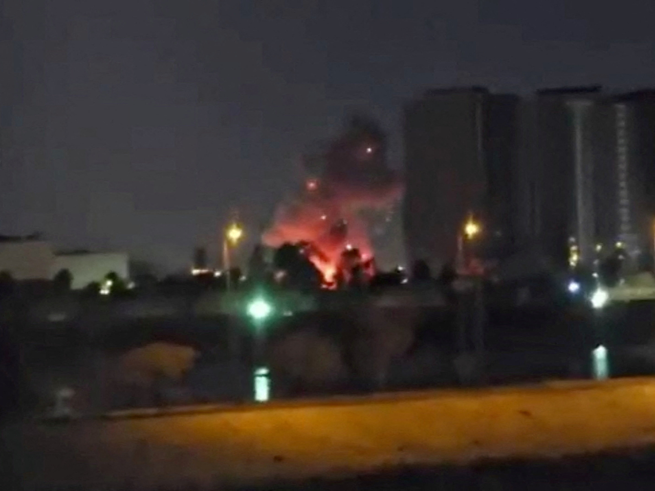 A fire breaks out around the site of the US embassy in Baghdad, Iraq, following reported drone and rocket strikes. Photo: Reuters