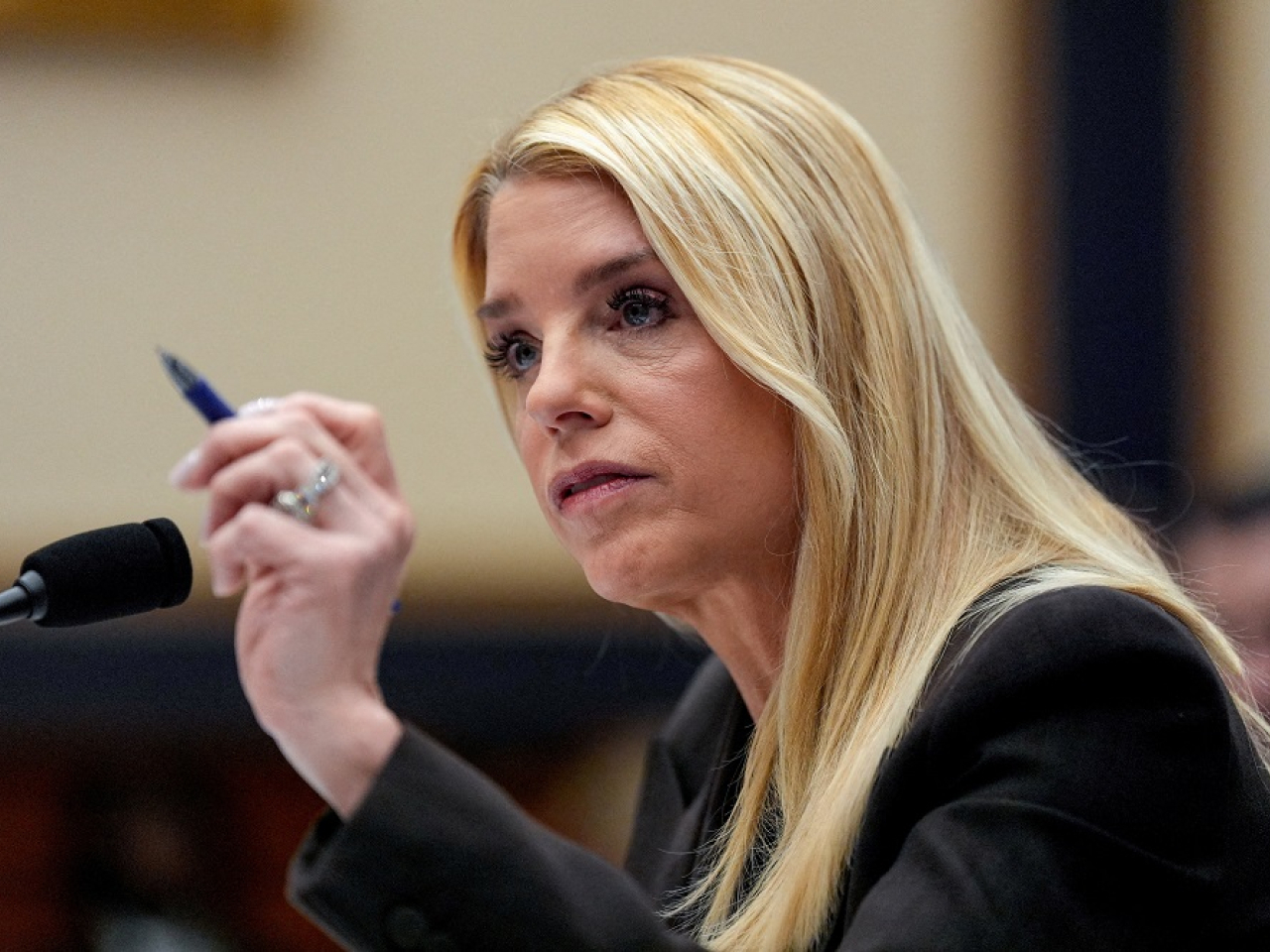 Pam Bondi faces accusations that the US Justice Department has concealed the names of powerful associates of Jeffrey Epstein in its release of millions of documents related to the late financier. File photo: Reuters