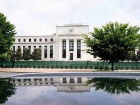 US Fed holds rates unchanged, expects higher inflation