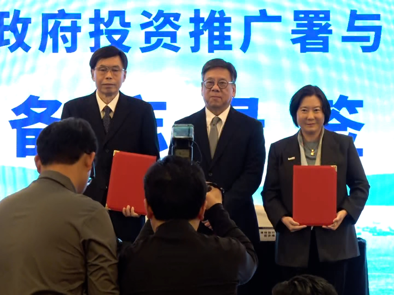 Secretary for Commerce and Economic Development, Algernon Yau (centre), says Hong Kong stands ready to help more mainland enterprises go global. Photo: RTHK