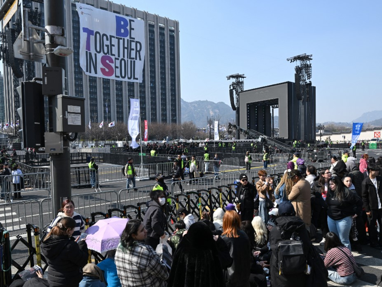 BTS fans pack the fringes of the concert area in Seoul's Gwanghwamun Square where the boyband is holding its comeback concert. Photo: AFP