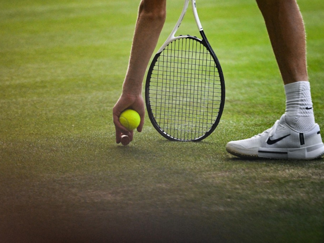 溫網去年啟用電子司線系統，結束持續147年的人工司線歷史。（法新社資料圖片）