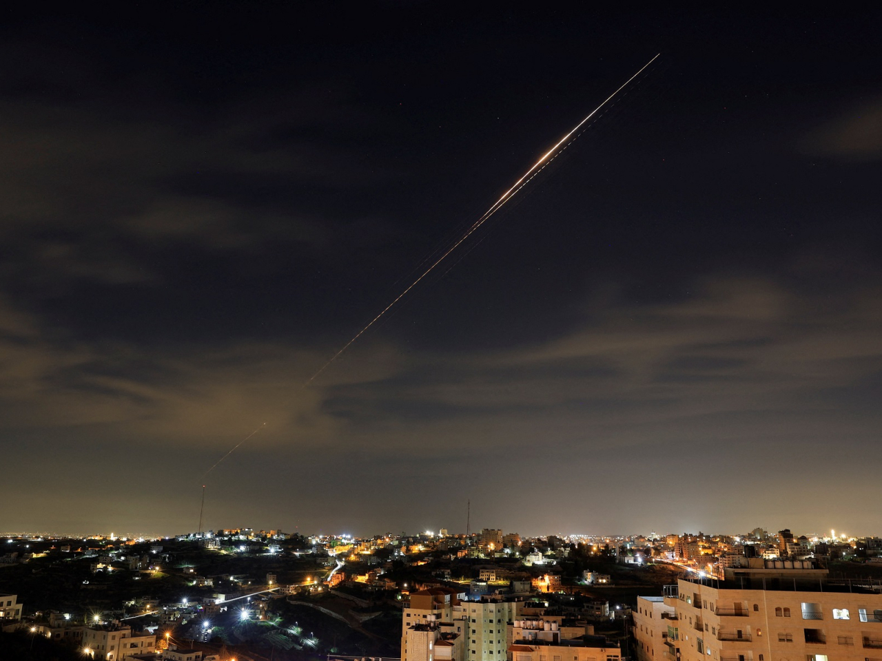 Iranian missiles fly towards Israel, amid the US-Israeli conflict with Iran, as seen from Hebron. Photo: Reuters
