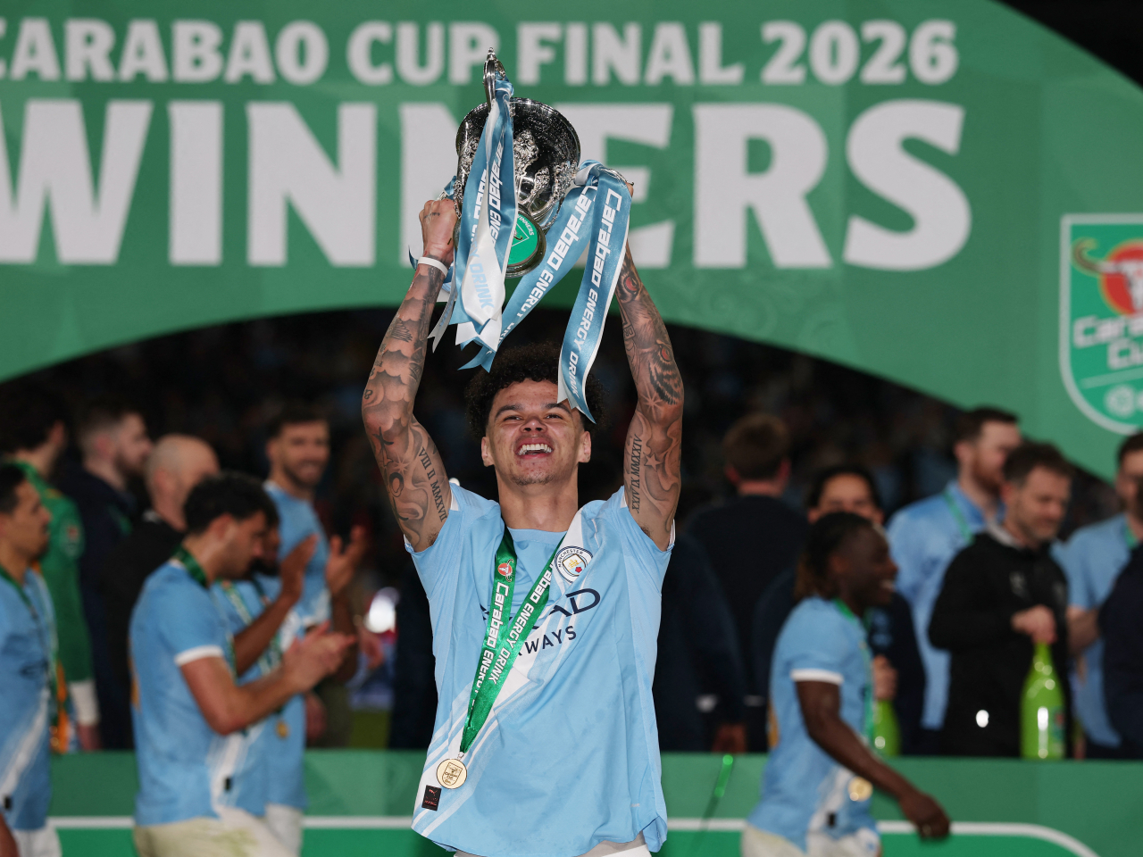 歷高奧懷利兩度建功，協助曼城捧盃。（路透社）