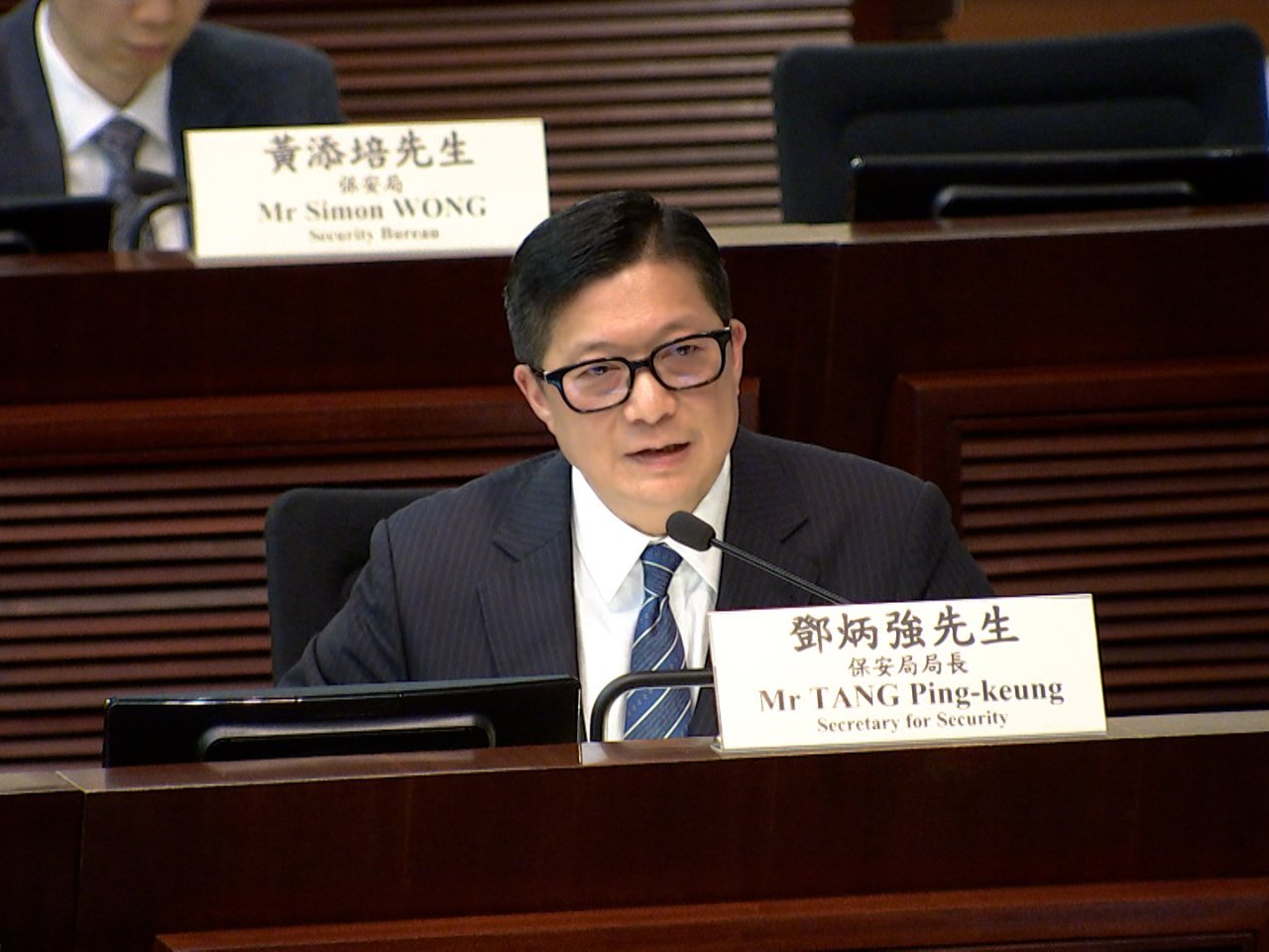 Chris Tang says refusing to unlock electronic devices upon request is the same as preventing officers with a warrant from entering a suspect's residence.