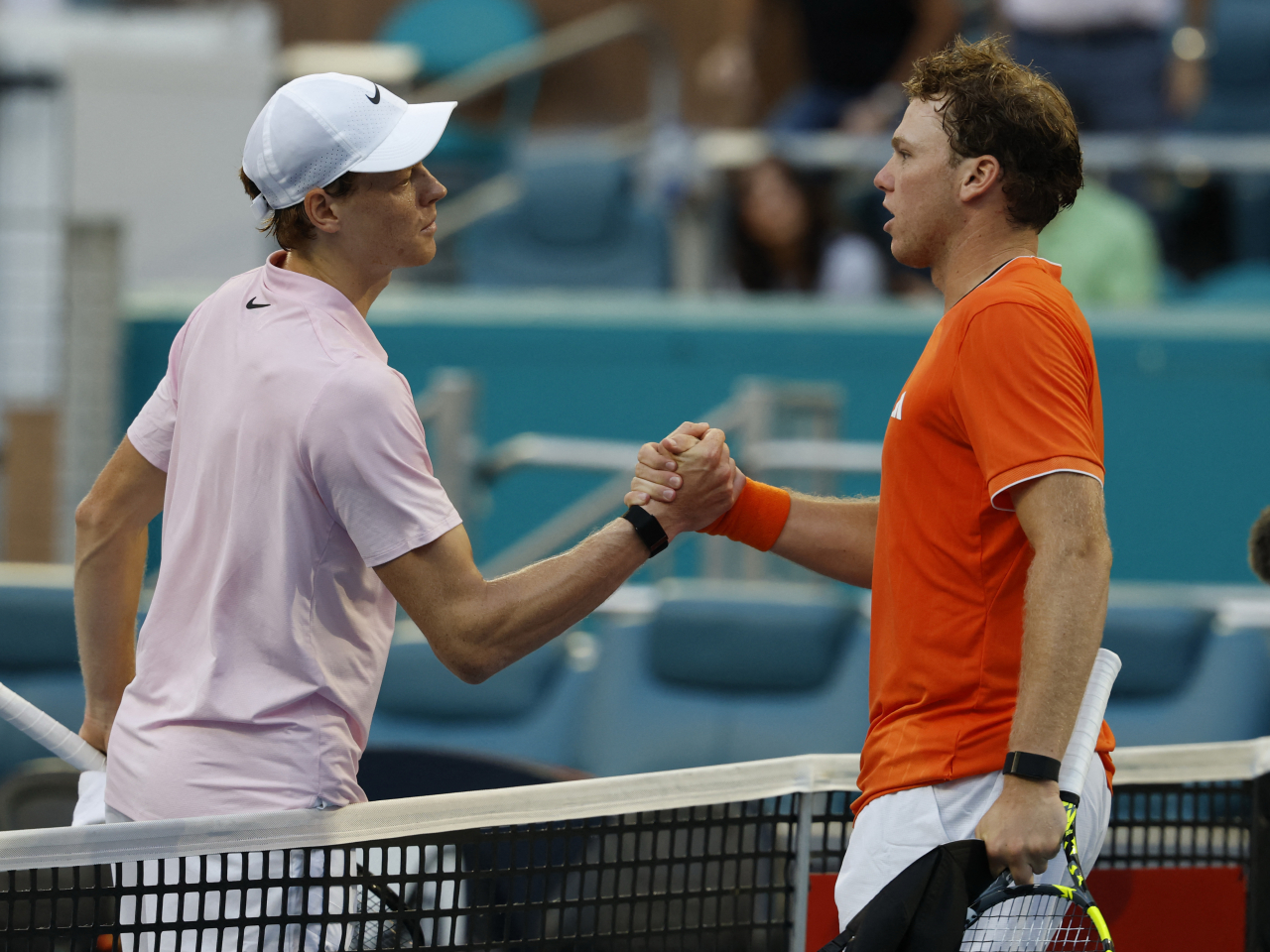 Sinner, left, continues his bid for the elusive "Sunshine Double" after a straight-sets win over Alex Michelsen. Photo: Reuters