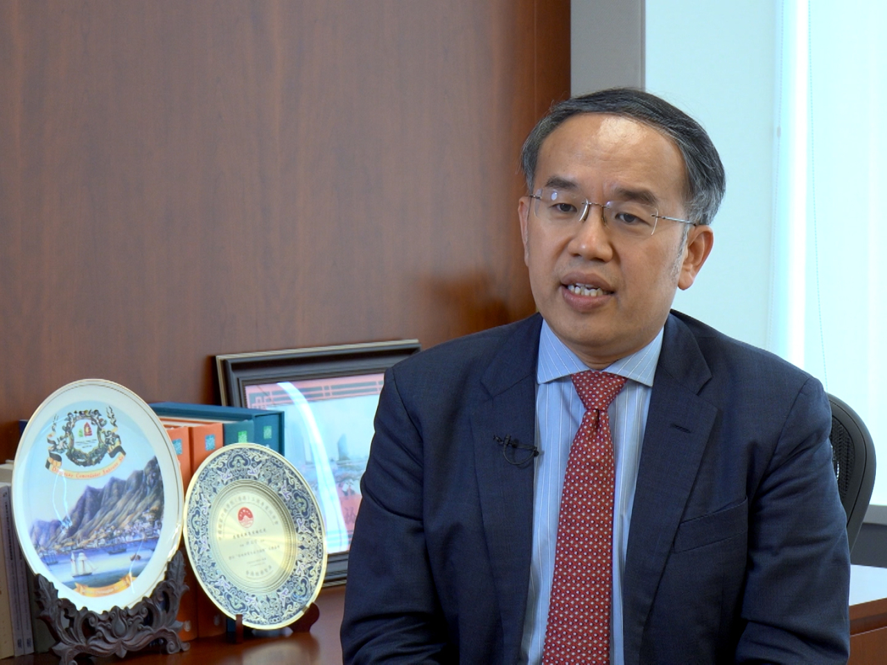 許正宇指香港正憑藉安全穩定環境，在全球複雜多變形勢下成為資金安全港。（港台圖片）