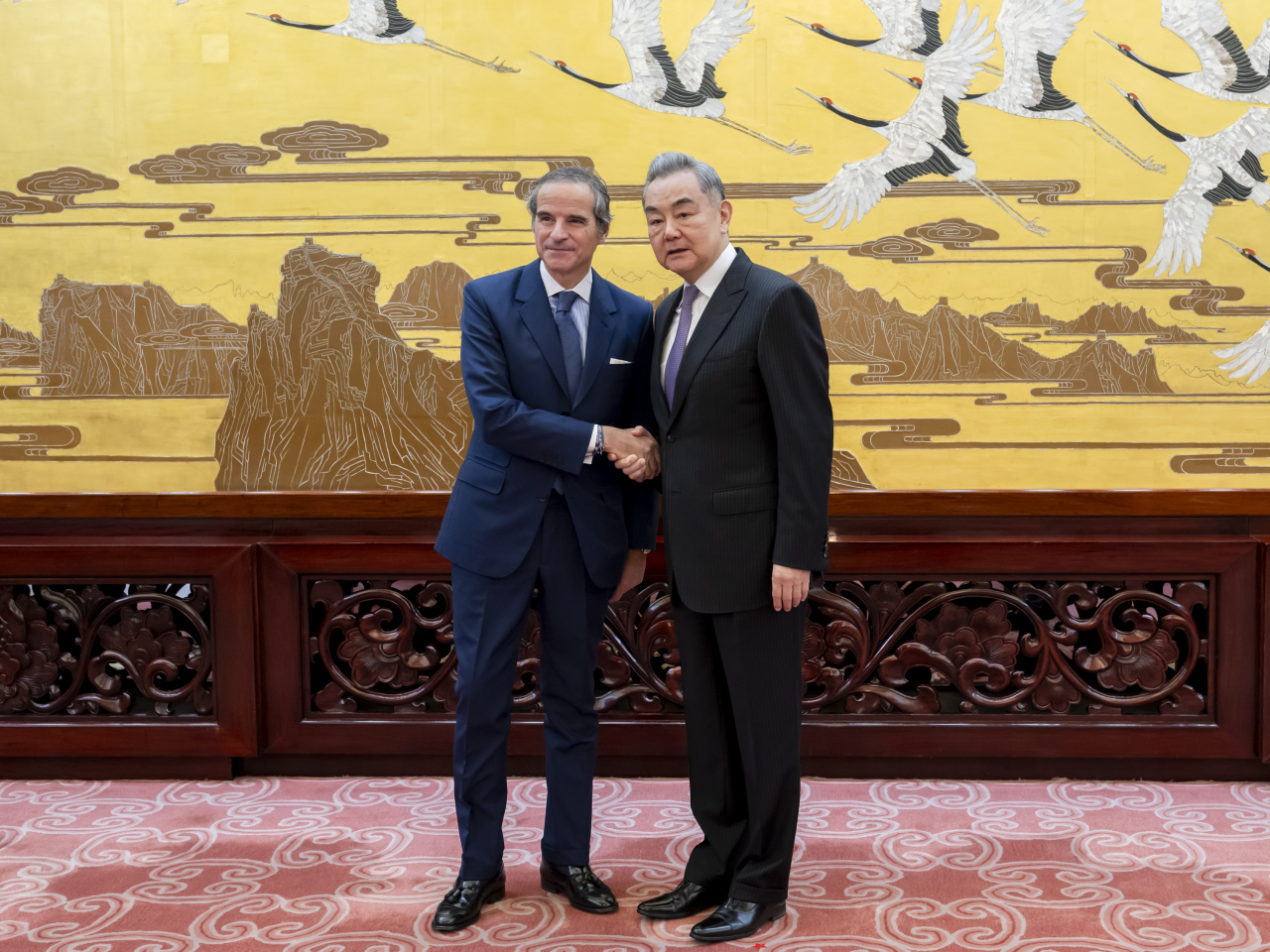 Wang Yi hosts IAEA director-general Rafael Mariano Grossi in Beijing. Photo: Xinhua