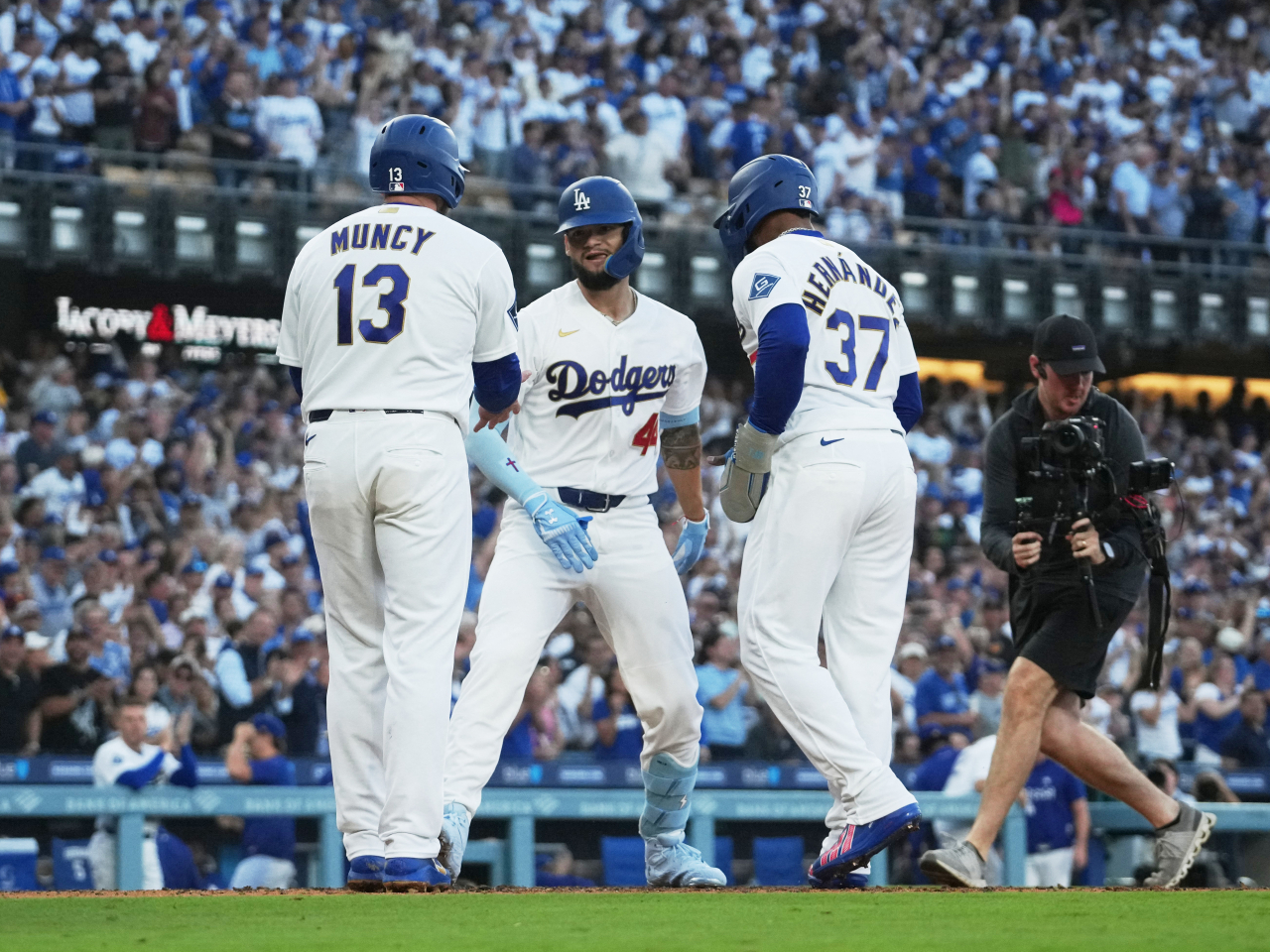 Dodgers outfielder Andy Pages, centered, smashed a three-run home run to give the hosts the lead in the fifth inning. Photo: Reuters