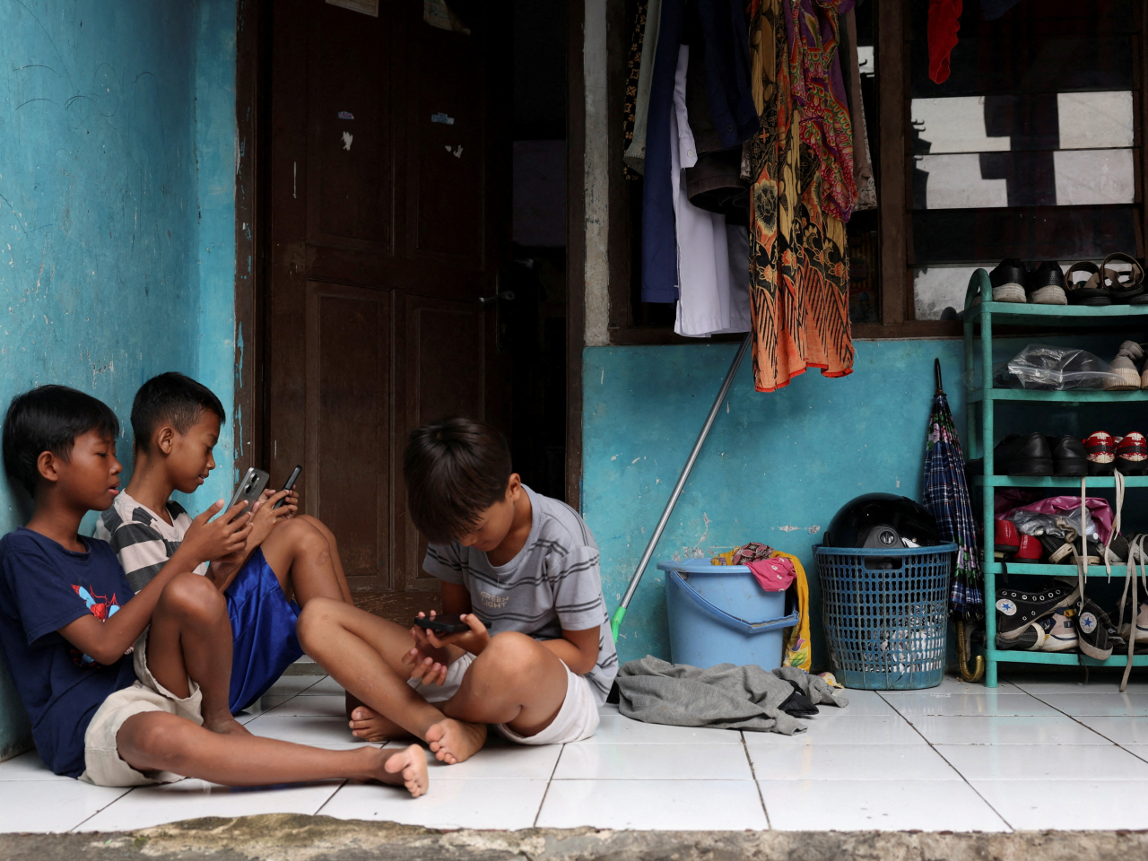 Internet addiction is one of the concerns behind Indonesia's social media ban for children under 16. Photo: Reuters