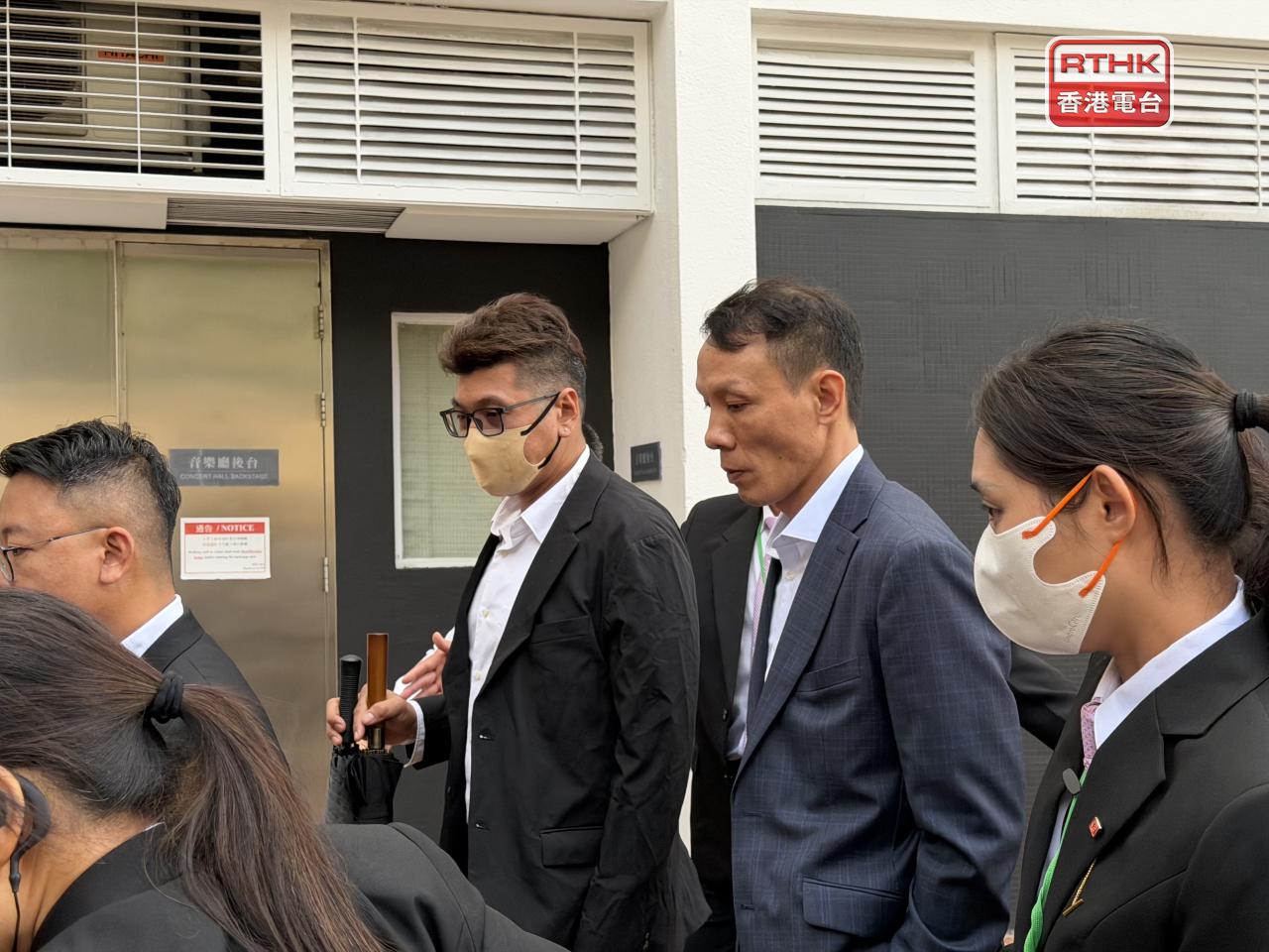 Electrical worker Wong Kin-wa, second right, says he did not look further into which contractor had ordered that the main switches at the residential buildings be turned off. Photo: RTHK