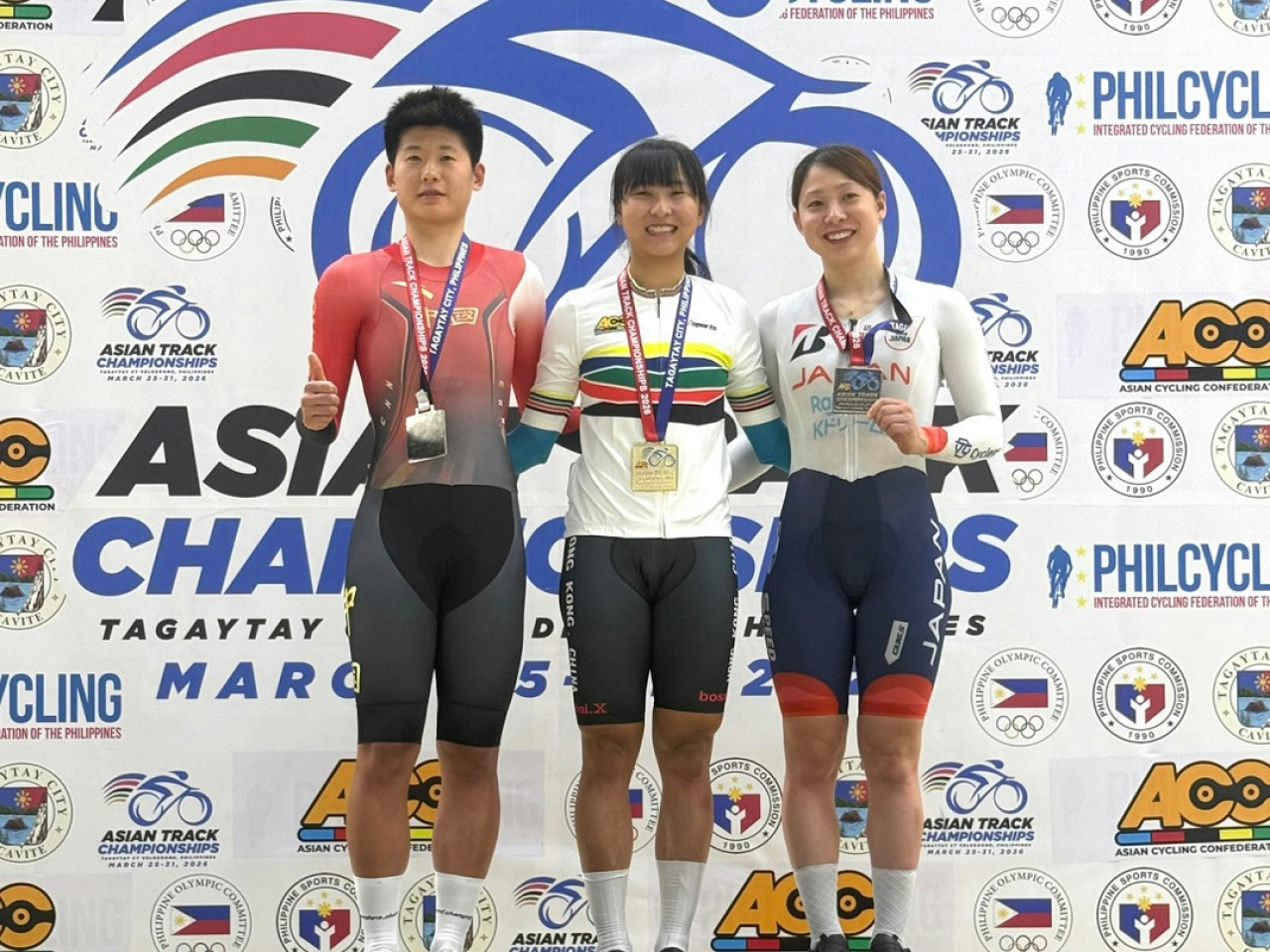 Ceci Lee, centre, is joined on the podium by Chen Ning, left, and Tsuyaka Uchino in the women's scratch race. Photo courtesy of the Cycling Association of Hong Kong, China