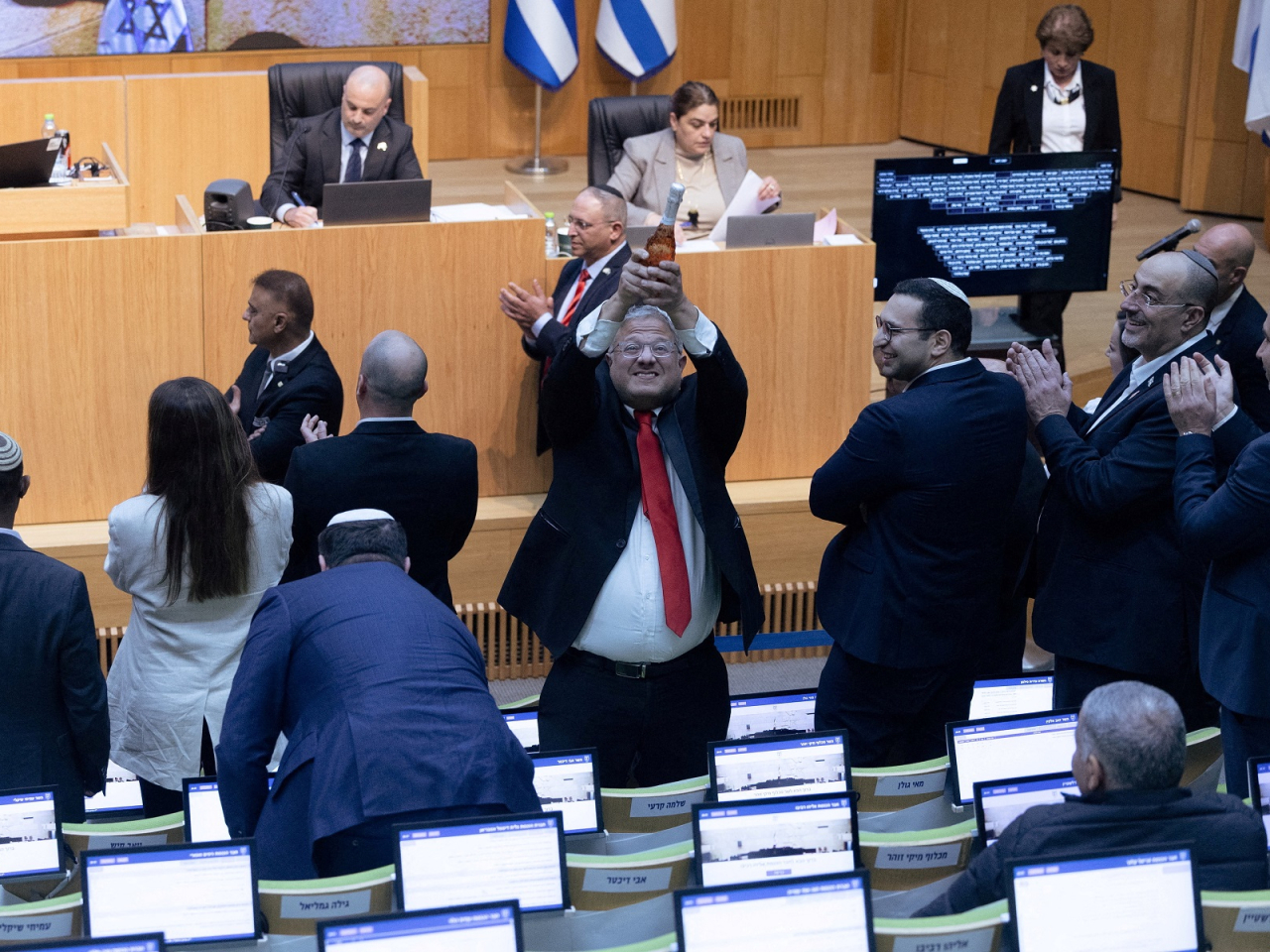 Israel's National Security Minister Itamar Ben-Gvir celebrates after Israel's parliament passed a law making the death penalty a default sentence for Palestinians convicted in military courts of deadly attacks. Photo: Reuters