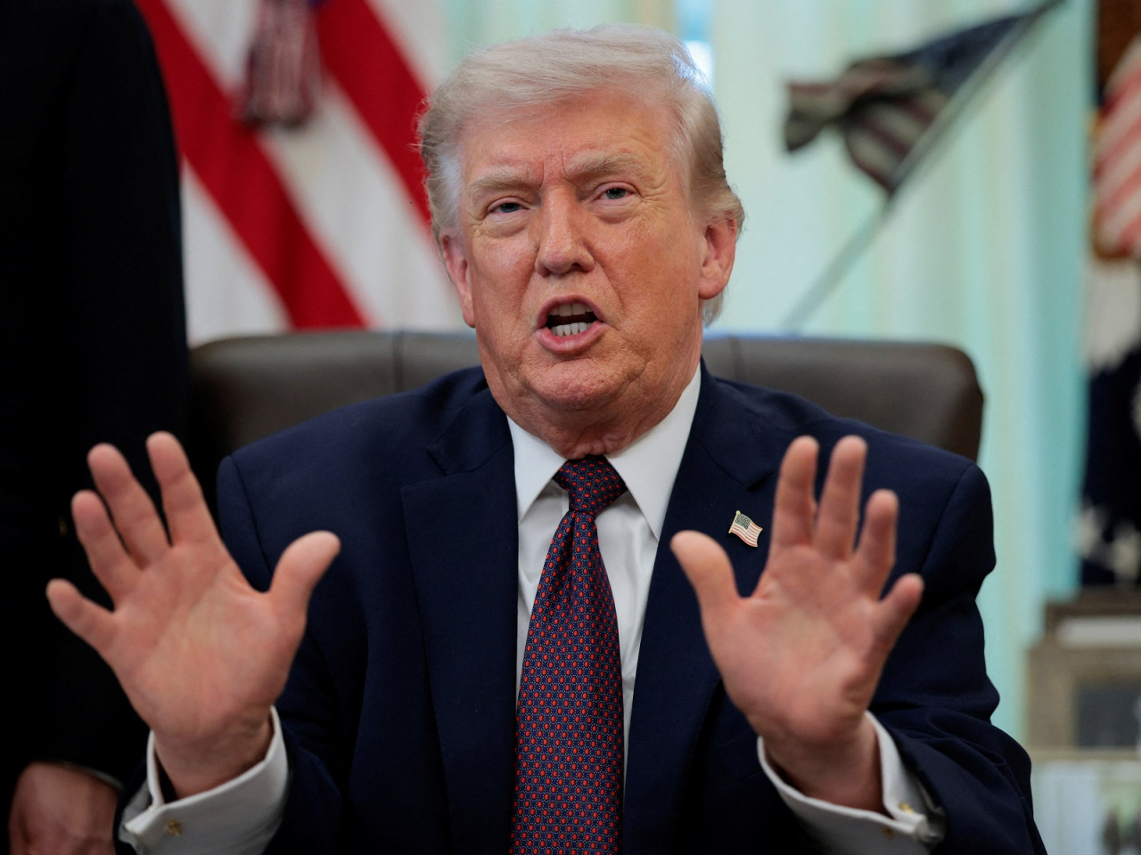 US President Donald Trump said Washington doesn't necessarily have to reach a deal with Iran to cease military operations in the country. Photo: Reuters