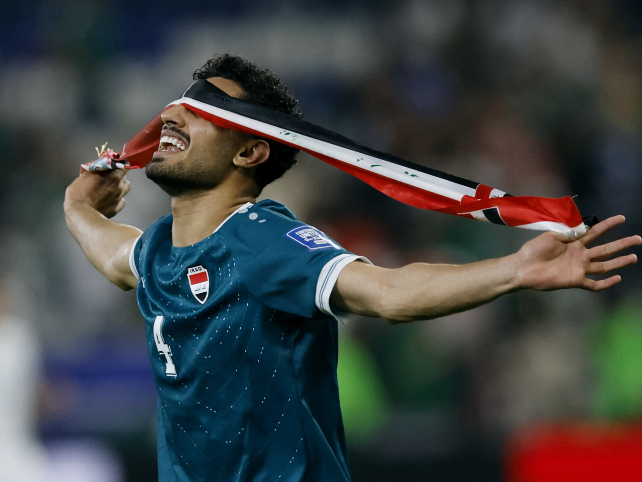 Iraq's Zaid Tahseen celebrates after the match as they qualify for Fifa World Cup finals for the first time in four decades. Photo: Reuters