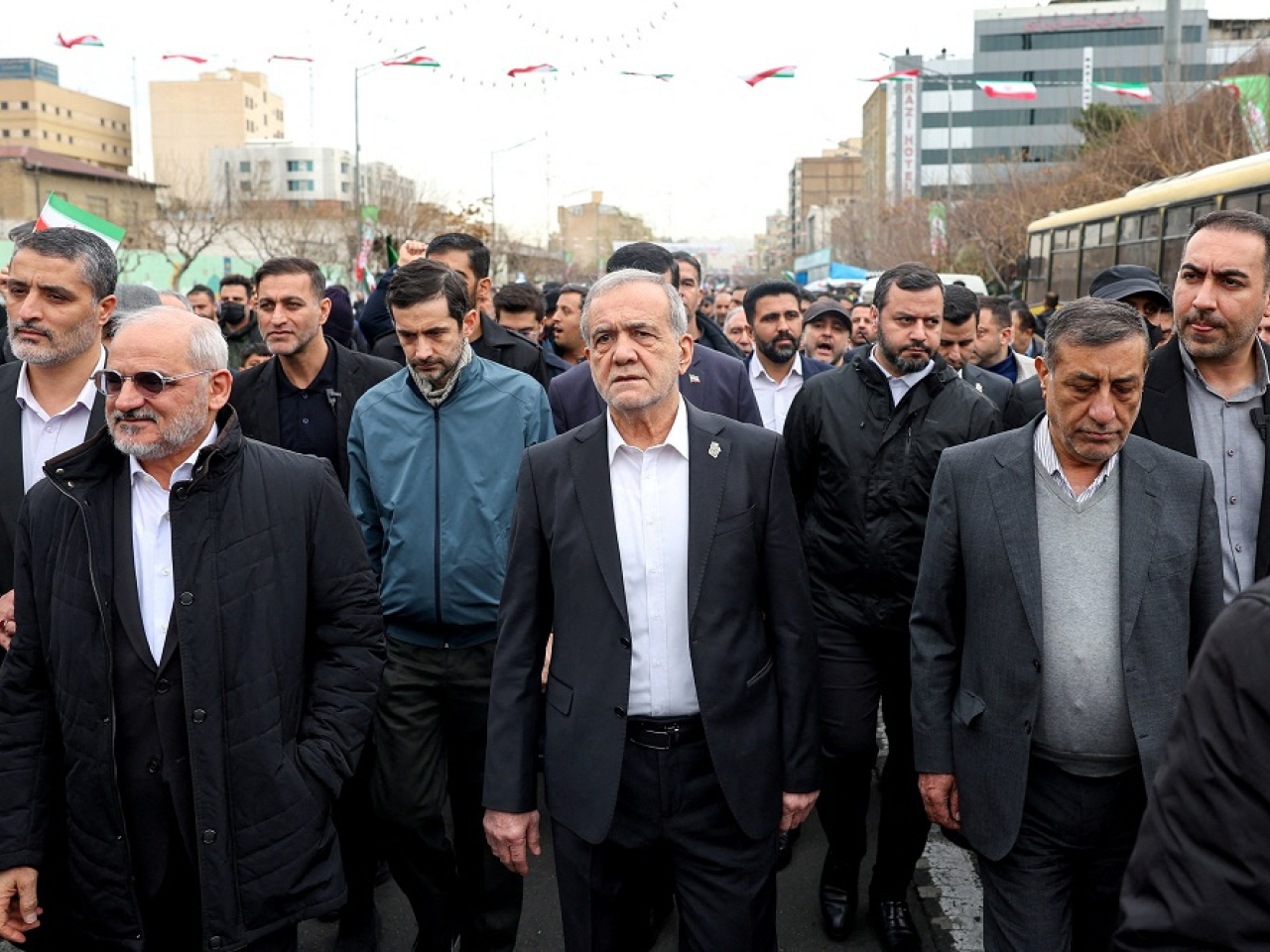 Iranian President Masoud Pezeshkian, centre, issued an open letter to the people of the United States questioning whether their interests are being served by the Mideast war. File photo: Reuters