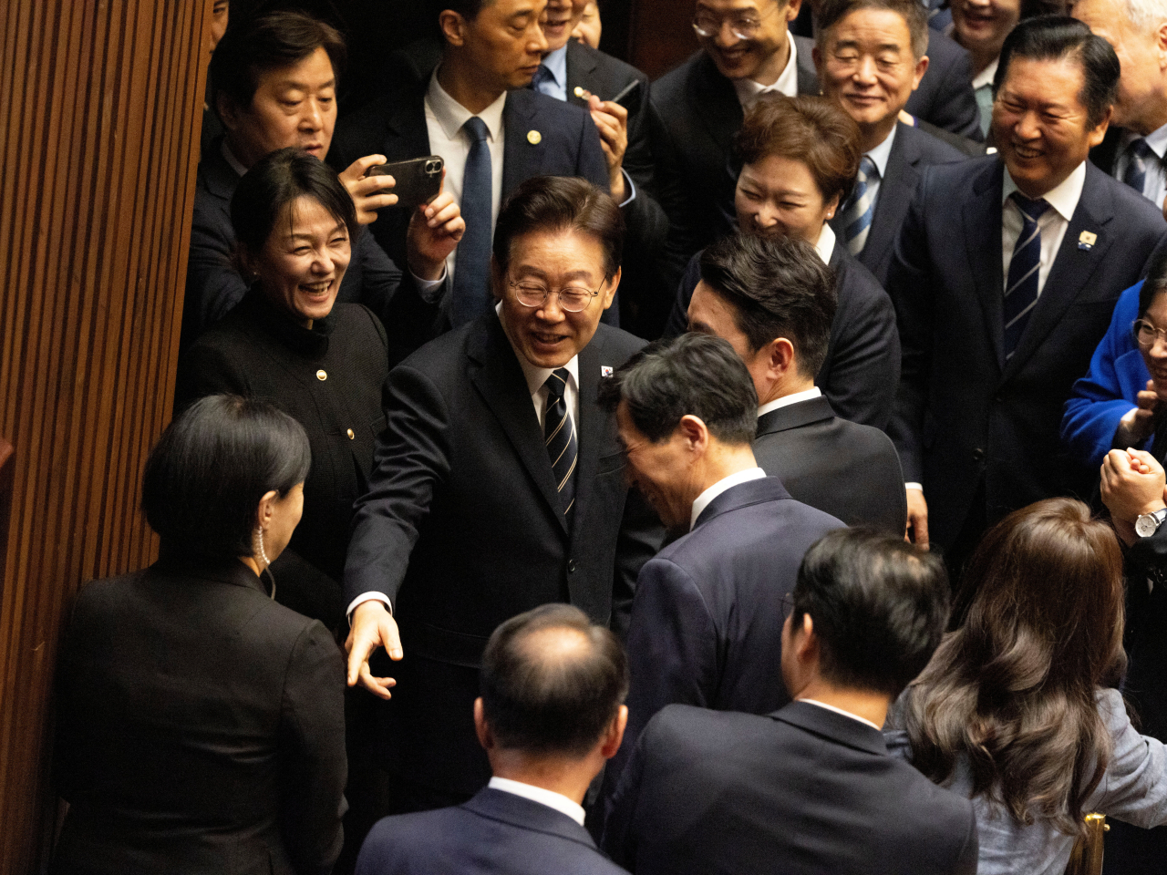 President Lee Jae-myung is roundly praised by lawmakers after proposing the first supplemetary budget bill of 2026 at the National Assembly in Seoul. Photo: Reuters