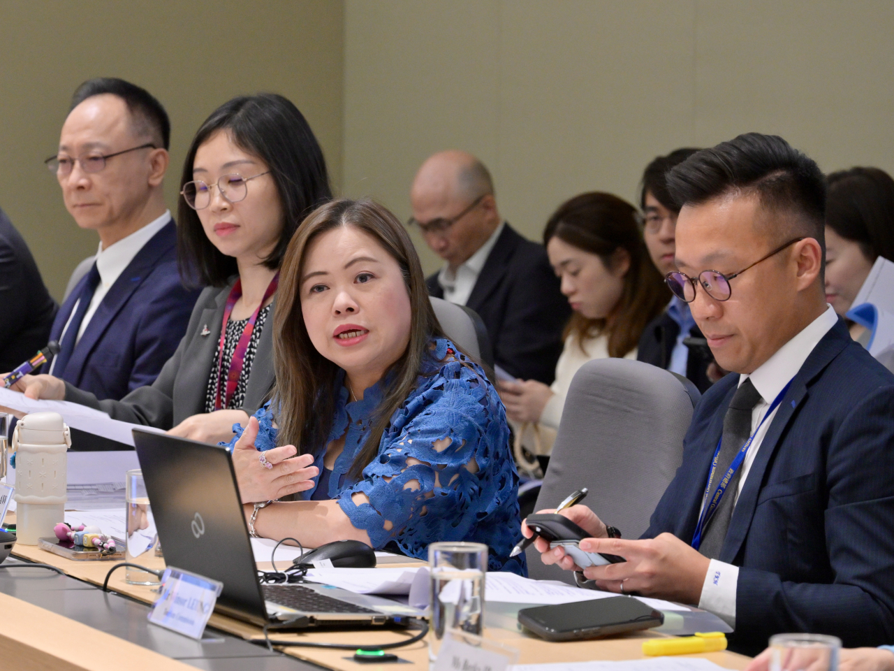 Rosanna Law speaks during an inter-departmental meeting to prepare for the Labour Day Golden Week holiday. Photo courtesy of Information Services Department
