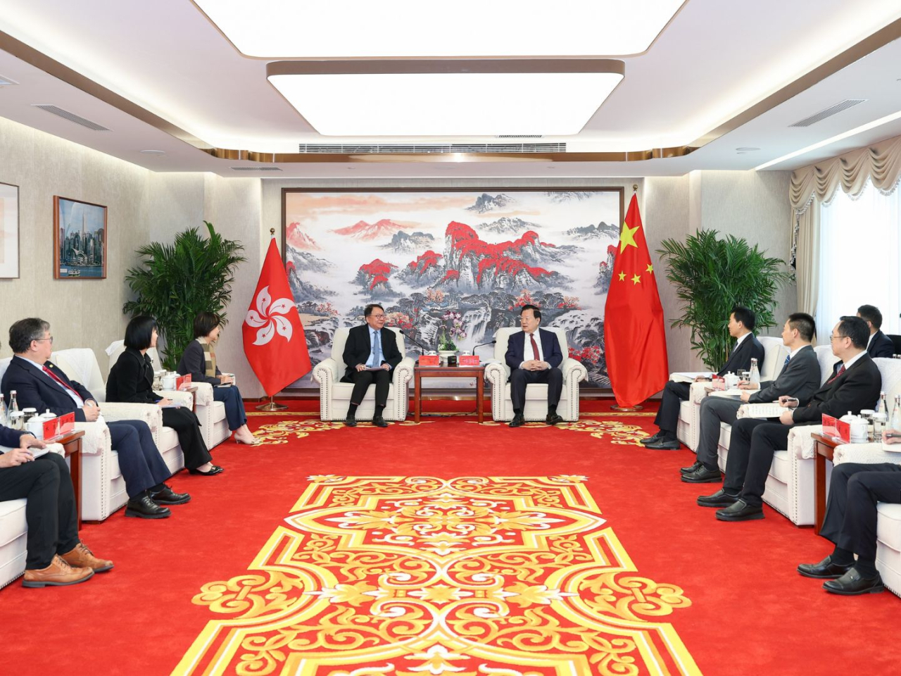 In a meeting with Xia Baolong, Eric Chan emphasised the working group&rsquo;s commitment to advancing NMUT development with improved quality, speed and efficiency. Photo courtesy of the Information Services Department