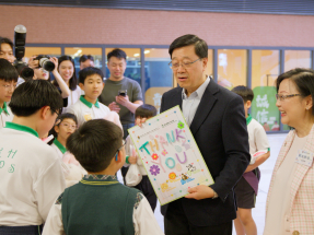 李家超喜見在校課後託管服務為學生家長帶來裨益　將研究擴展計劃