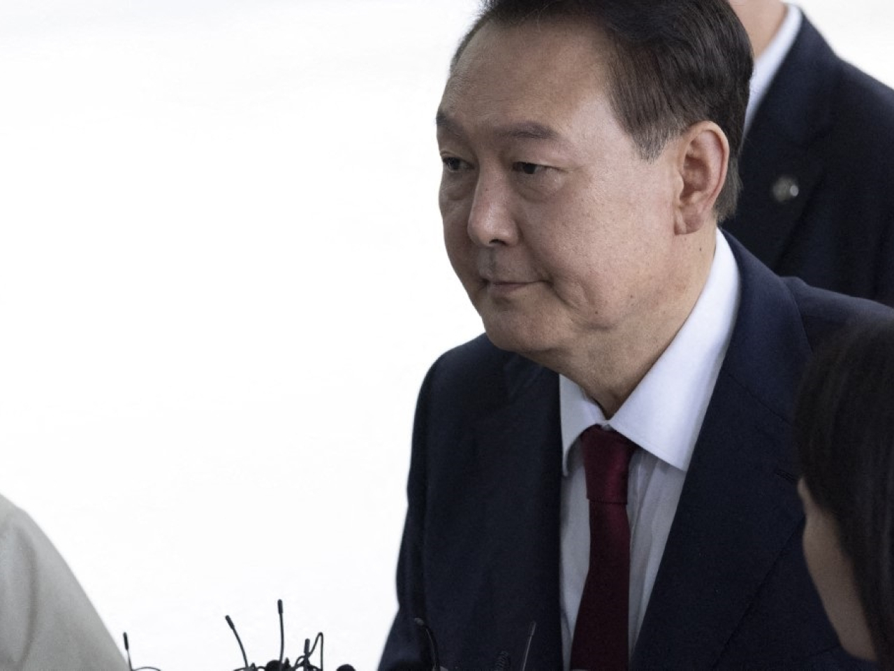 尹錫悅涉嫌將公權力私有化、極不配合相關調查和審判，以及從未反省及向國民道歉。（法新社資料圖片）