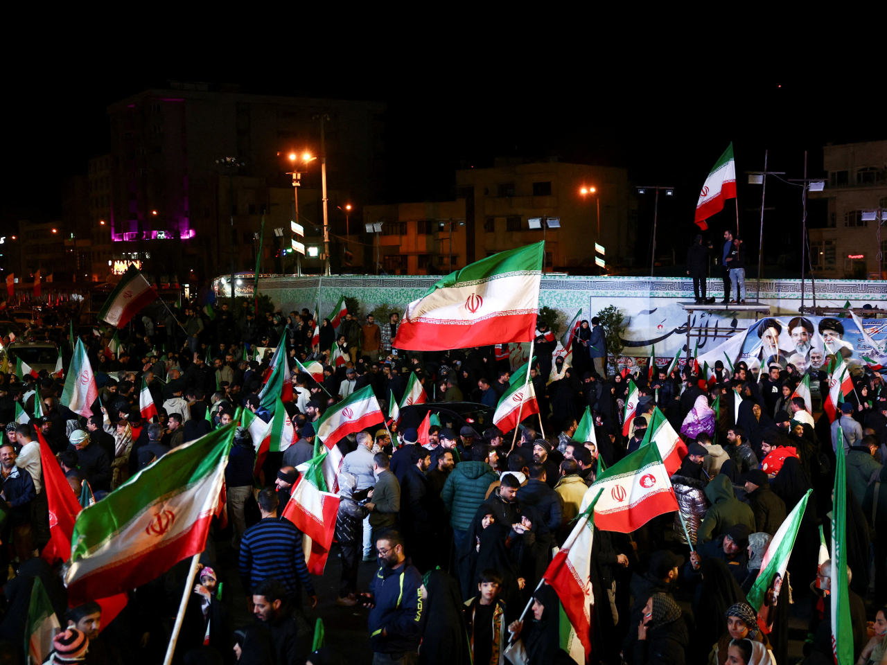 People gather after a two-week ceasefire in the Iran war was announced, in Tehran. Photo: Reuters