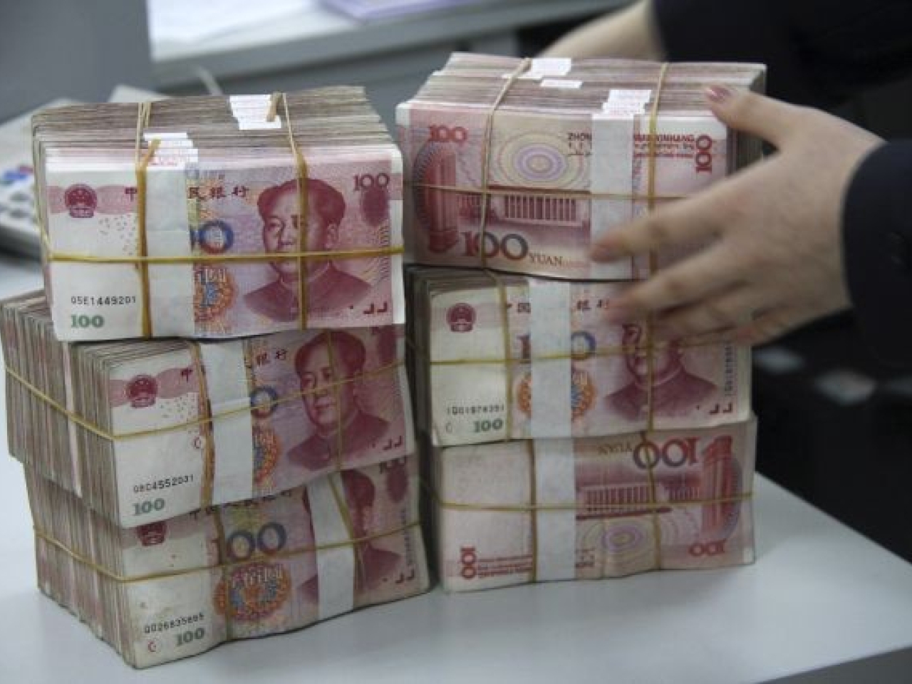 渣打報告指，企業在貿易和供應鏈方面已廣泛使用人民幣，但在融資和財資管理方面則有待進一步增長。（新華社資料圖片）