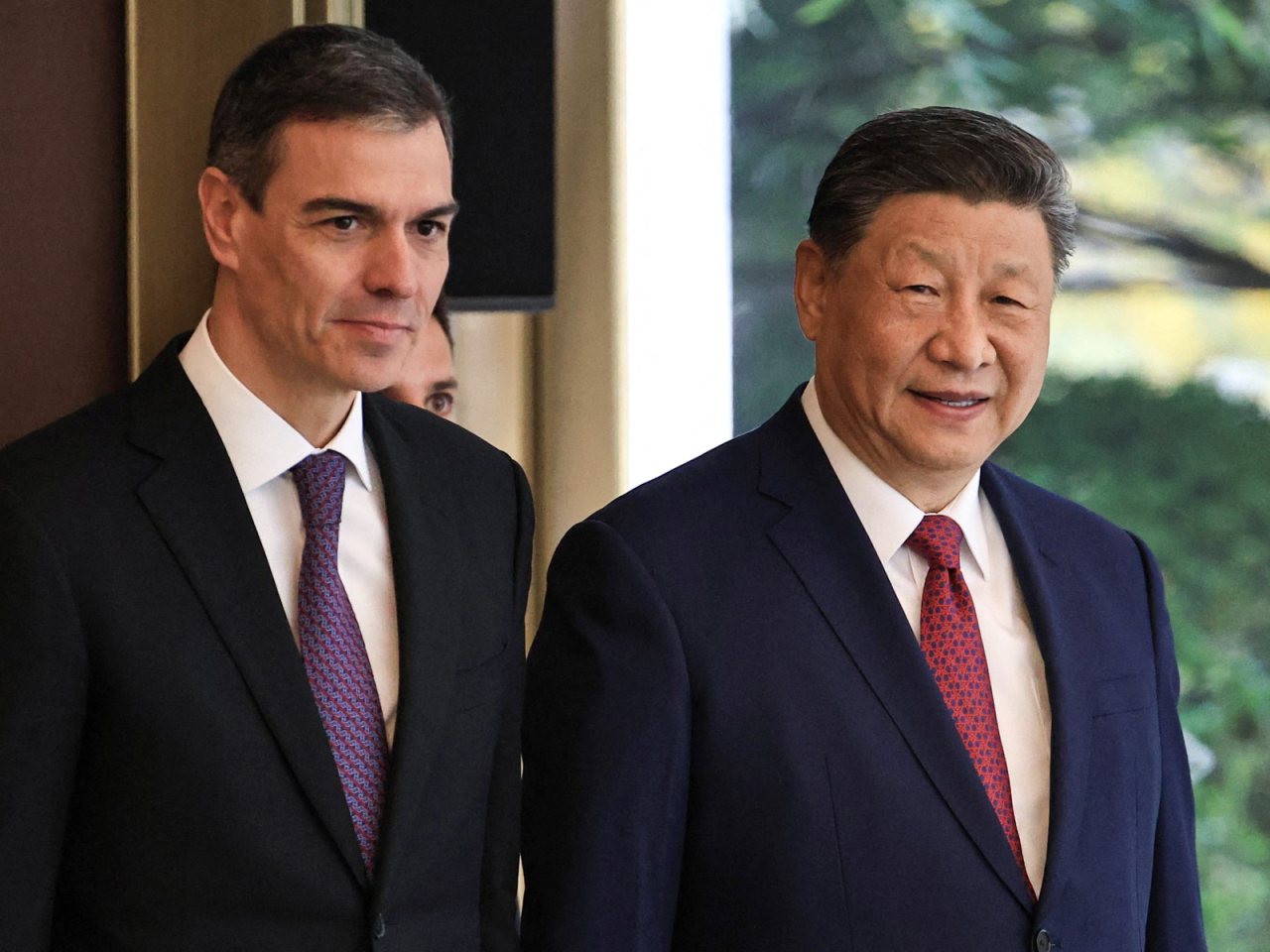 習近平去年4月在北京與桑切斯會面。（法新社資料圖片）