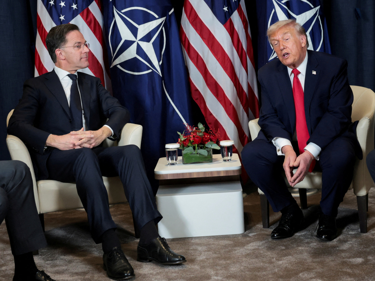 Nato chief Mark Rutte (left) has never been shy to flatter the US leader, even calling him "daddy" at a summit last year. File photo: Reuters