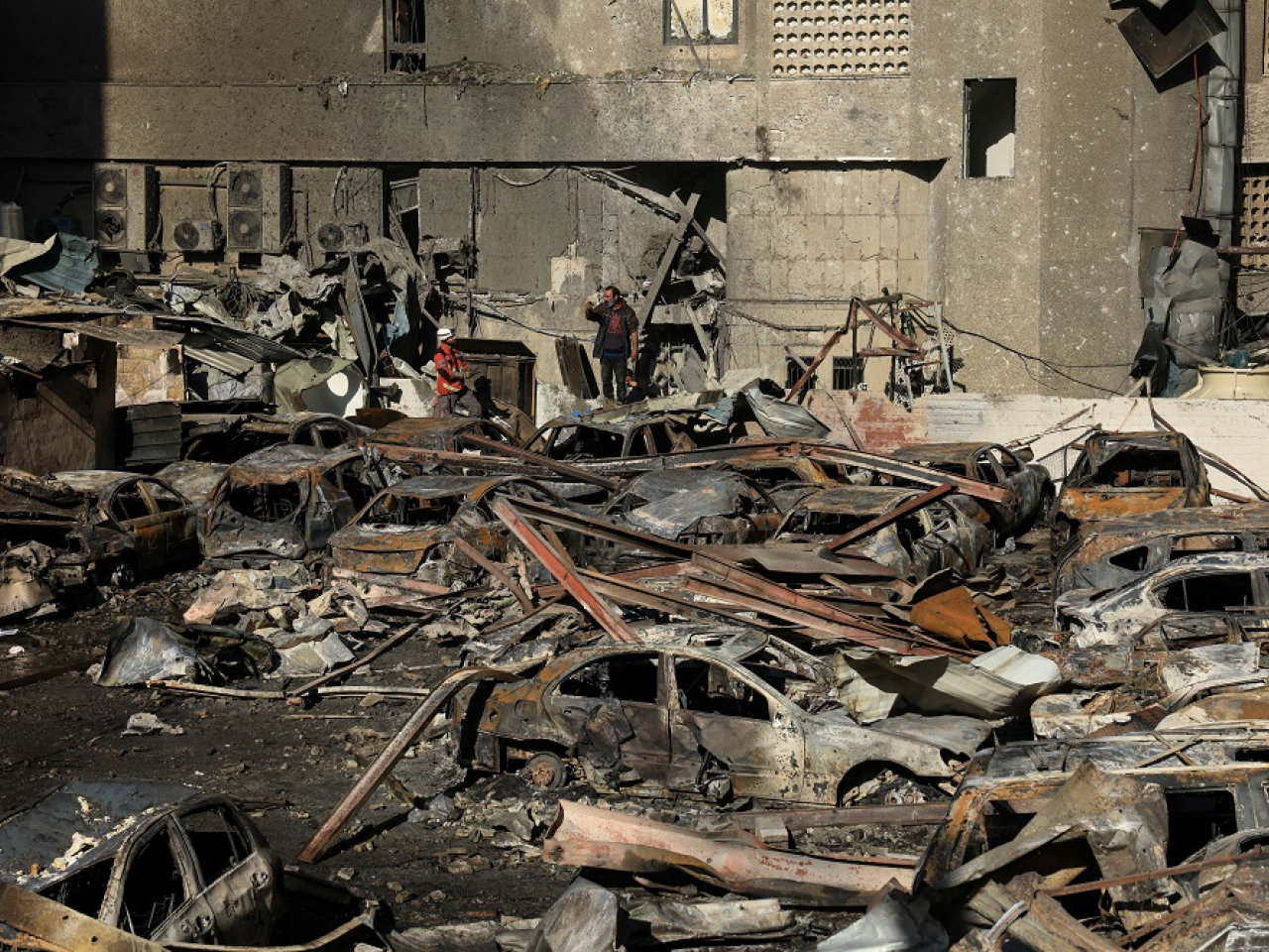 A survivor surveys the damage after an Israeli air strike on a residential neighbourhood in Beirut. Photo: Reuters