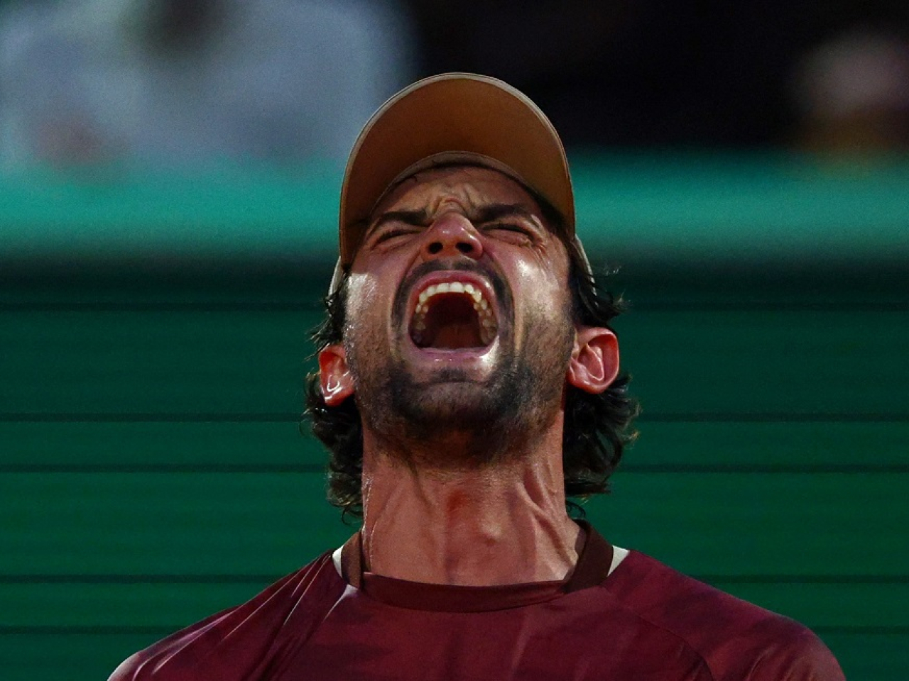 Spurred on by the partisan crowd all evening, Vacherot planted his feet, tilted his head and roared back after reaching the semi-finals of his home-town tournament. Photo: Reuters