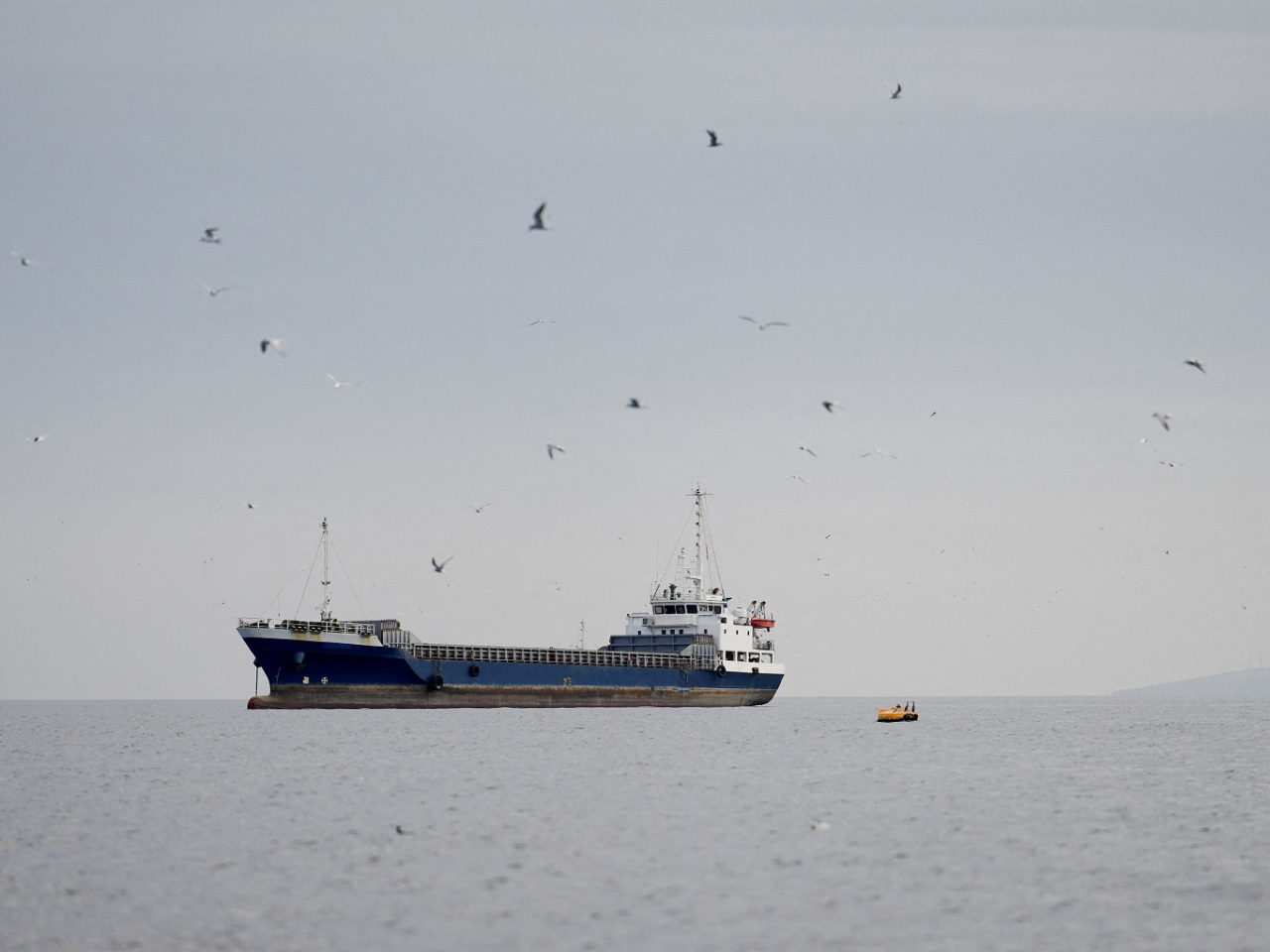 A vessel sails through the Strait of Hormuz, off the coast of Oman&rsquo;s Musandam province. Photo: Reuters