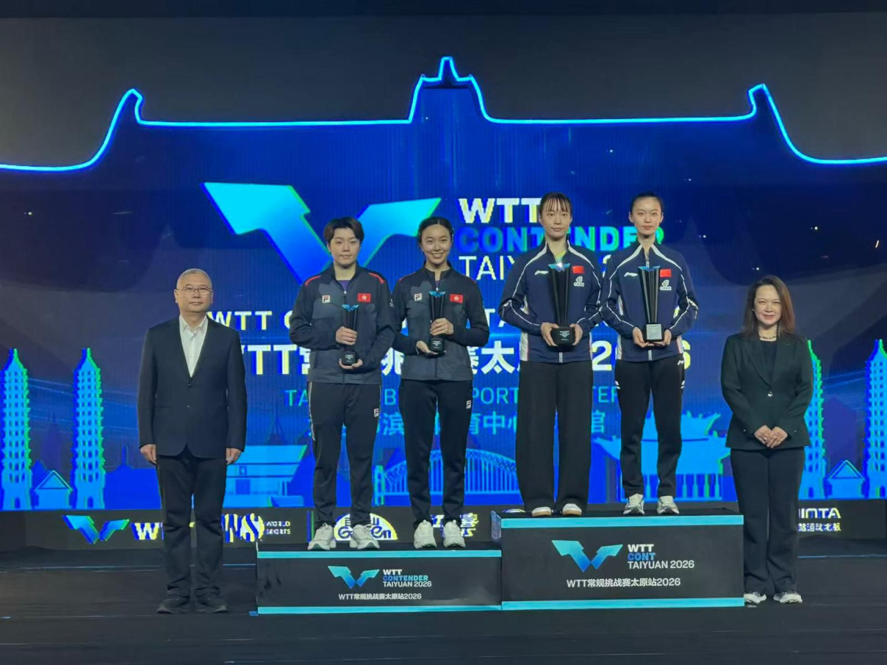 Doo and Ng (second and third from left) put up a spirited effort against their hosts opponents. Photo courtesy of World Table Tennis