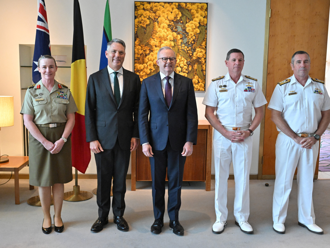 At the reshuffle announcement are, from left, Susan Coyle, Richard Marles, Anthony Albanese, Mark Hammond and Matthew Buckley. Photo: Reuters