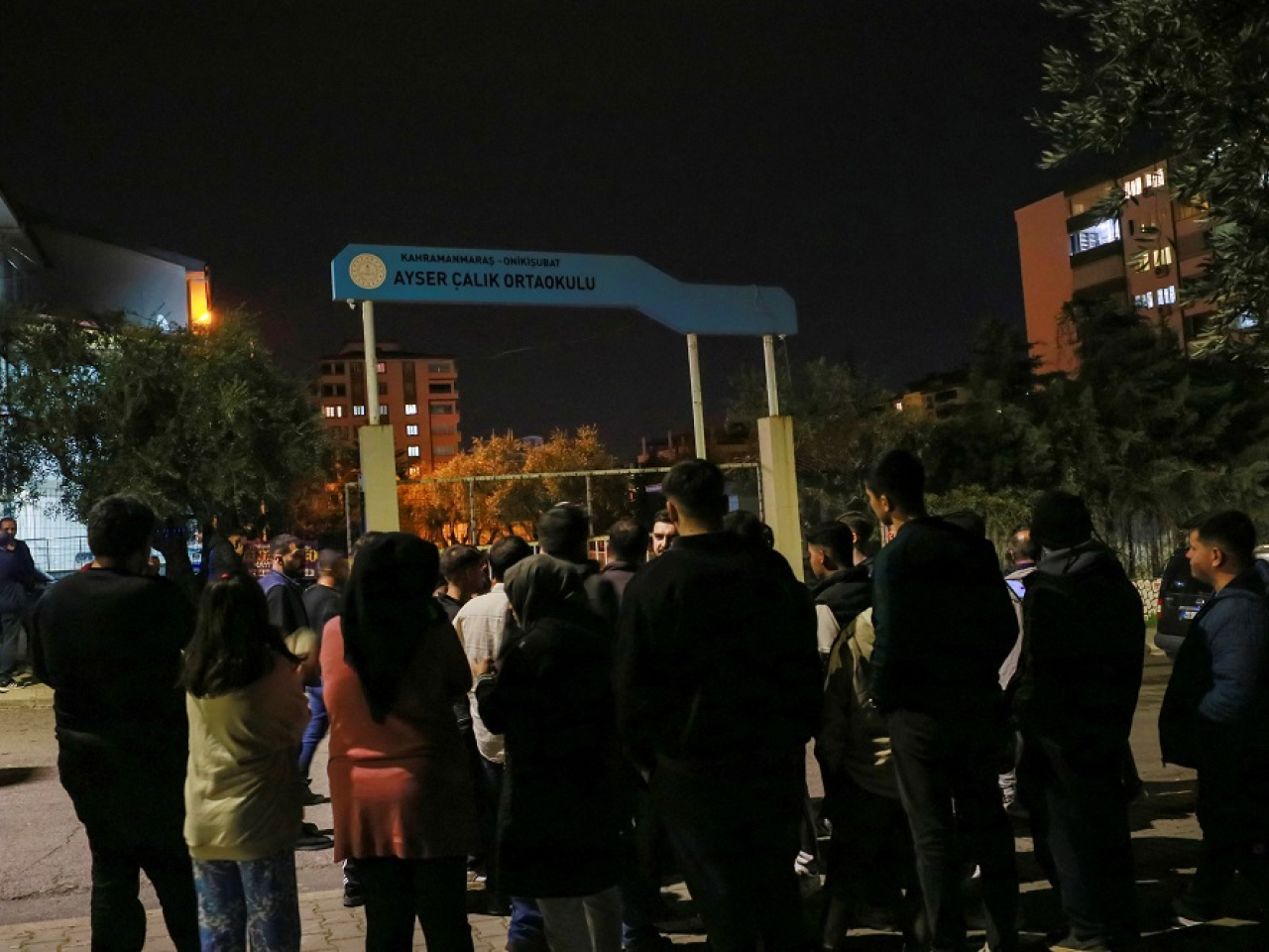 Anxious parents wait for news after the rampage by a 14-year-old who was armed to the teeth. Photo: Reuters