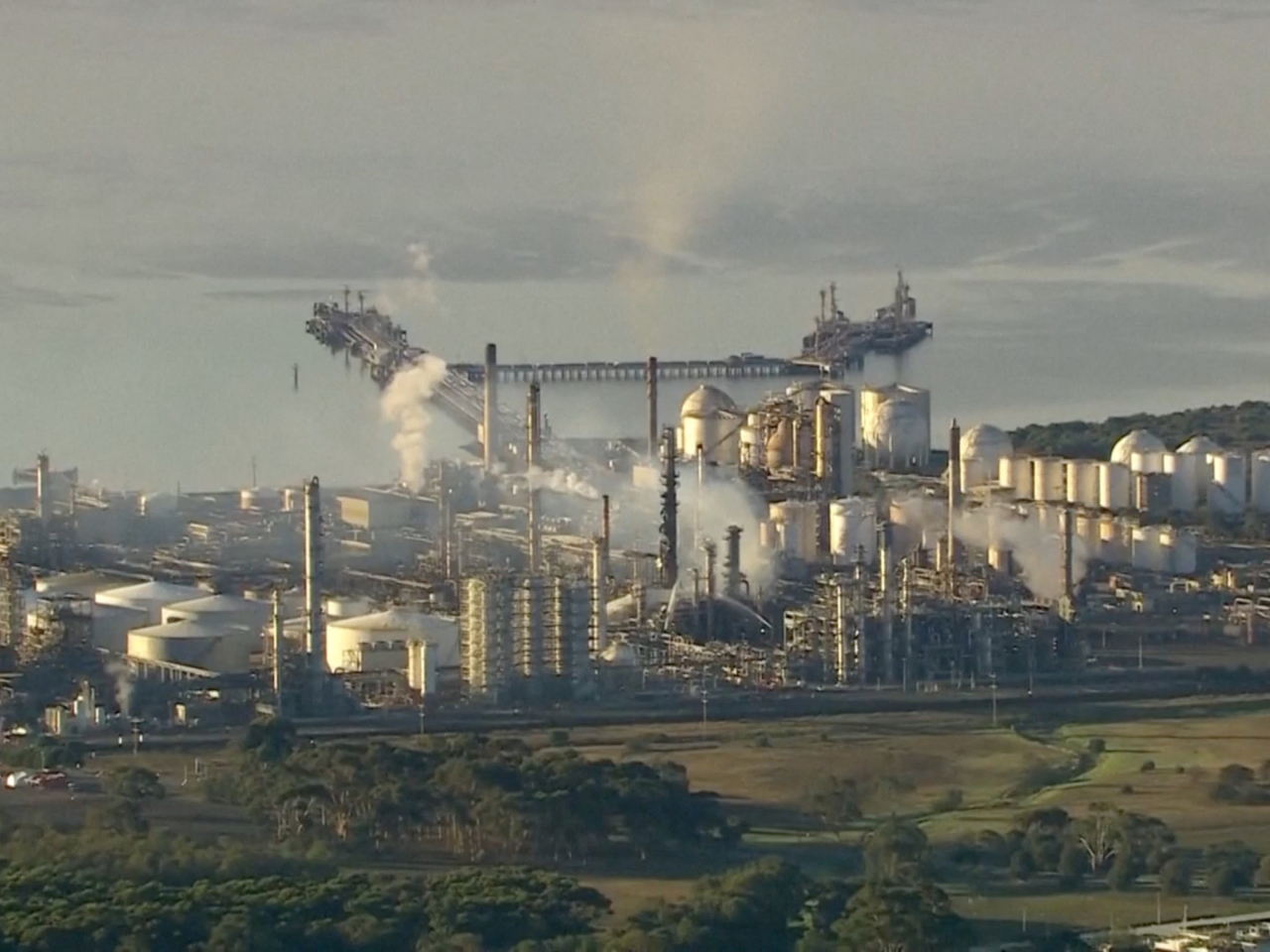 Smoke rises following the fire at Viva Energy Group's refinery in Geelong, Australia. Photo: Reuters