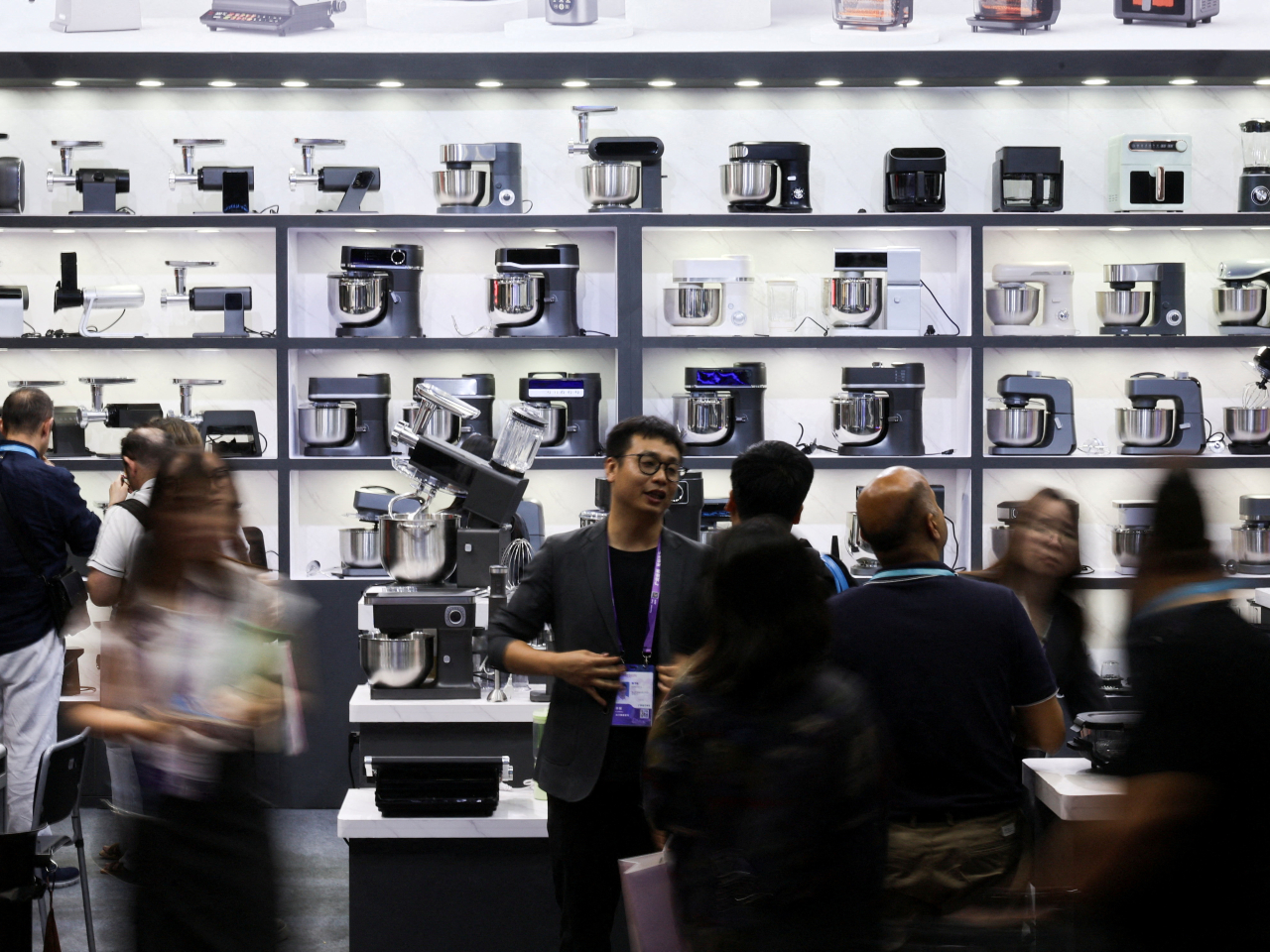 China will continue to implement consumer goods trade-in programme while aligning consumption promotion with improvements in people's livelihoods. Photo: Reuters