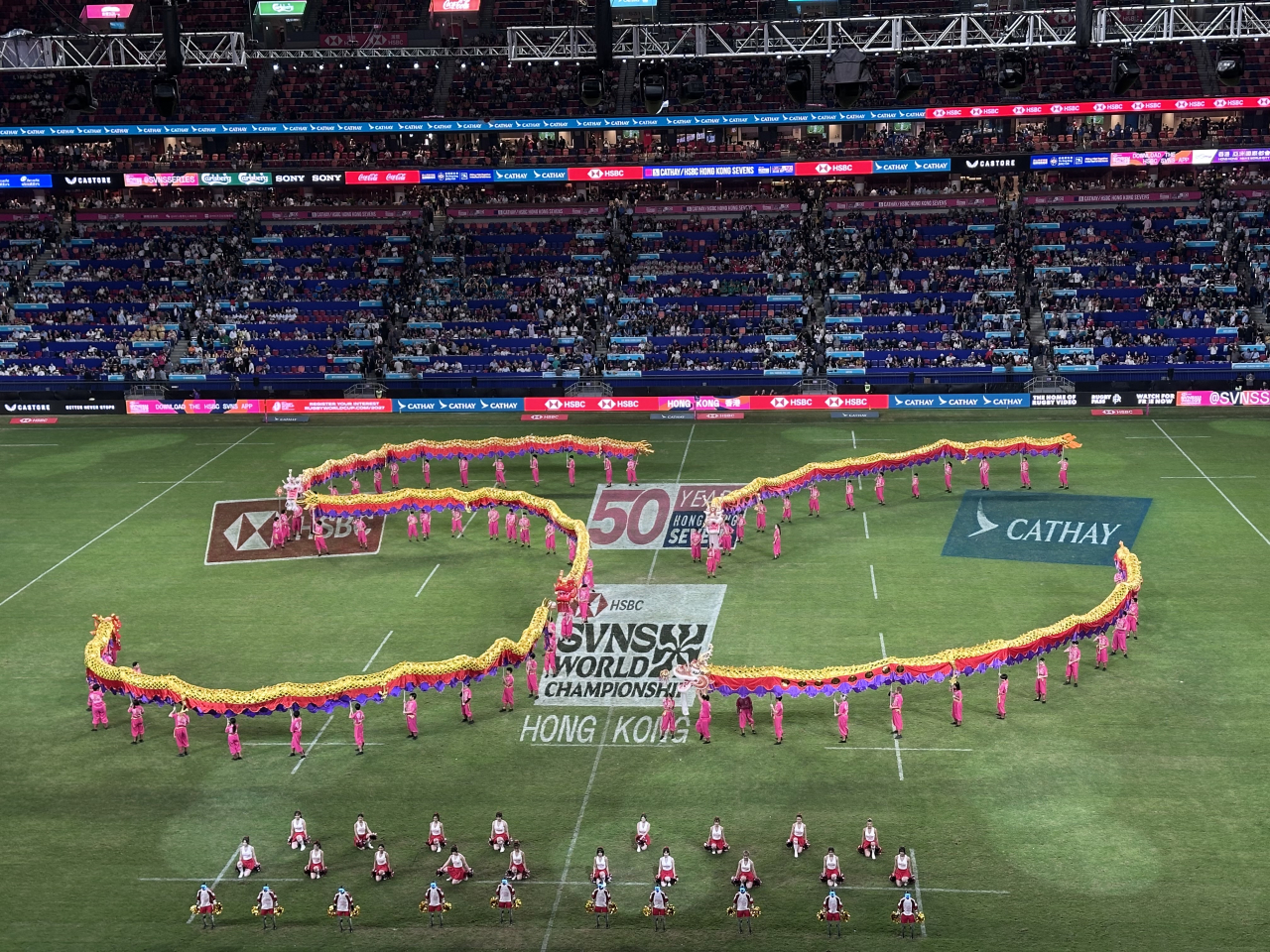 Five dragons wove across the pitch before coming together to form the number 50. Photo: RTHK