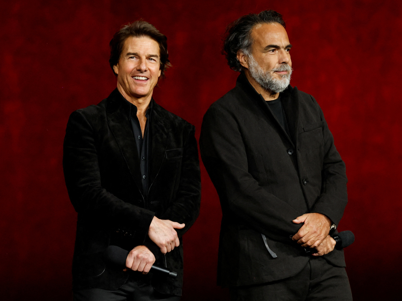 Tom Cruise and Oscar-winning director Alejandro Gonzalez Inarritu at CinemaCon in Las Vegas. Photo: Reuters