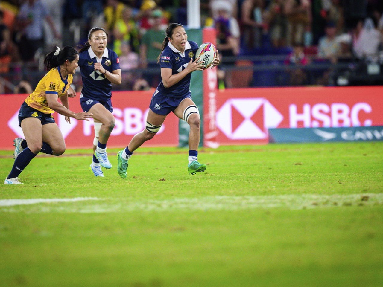 Women's captain Chloe Chan runs with the ball in the SAR's clash against Thailand in the Melrose Claymores competition. Photo courtesy of Hong Kong, China Rugby
