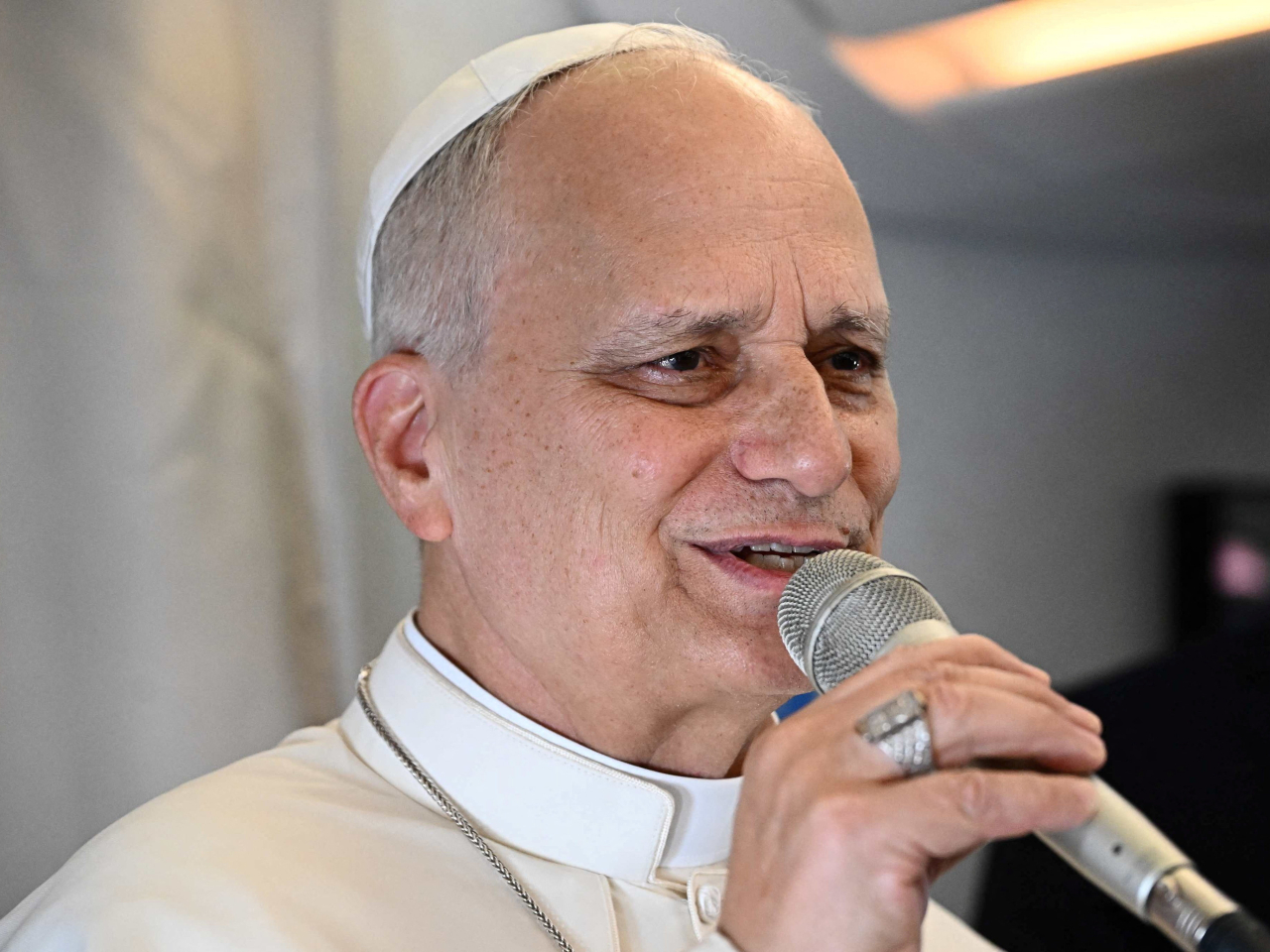 On his flight to Angola, Leo said his Thursday comments about "tyrants" were not directed at Trump. Photo: Reuters