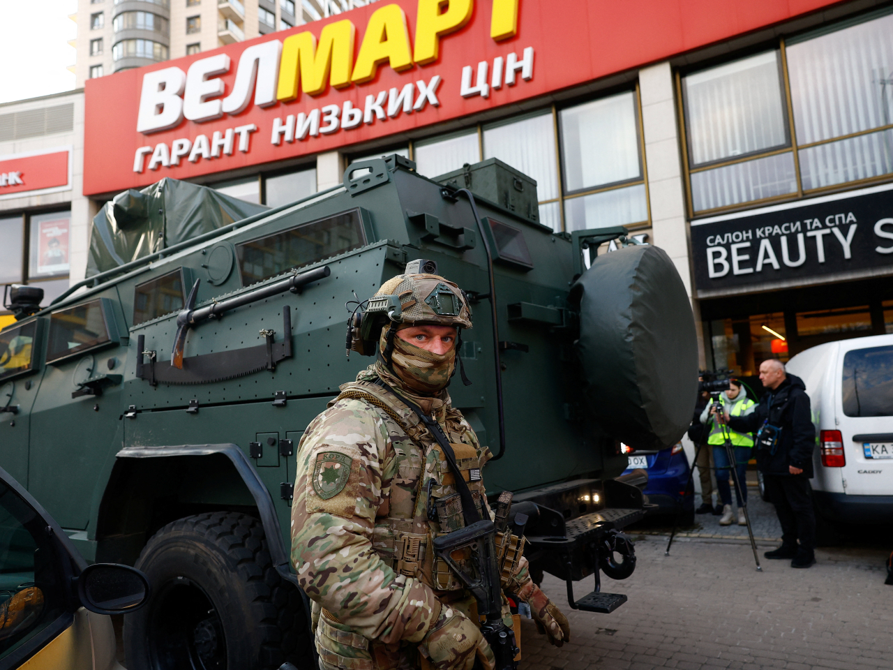 The supermarket &ndash; where the man barricaded himself into and was killed on Saturday &ndash; cordoned off by a heavy security presence. Photo: Reuters