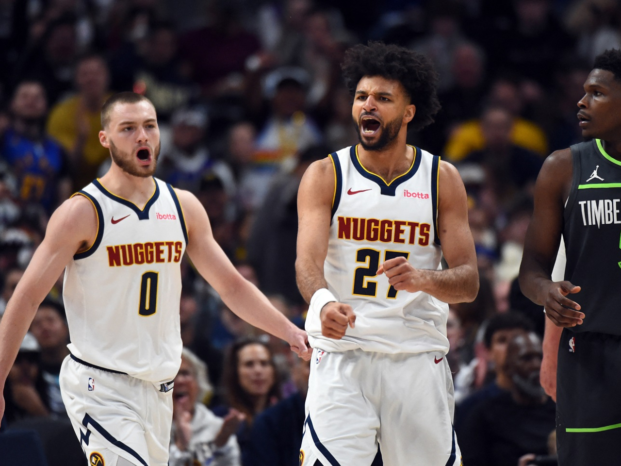 Jamal Murray (centre) led all scorers with 30 points as Denver beat Minnesota. Photo: Reuters