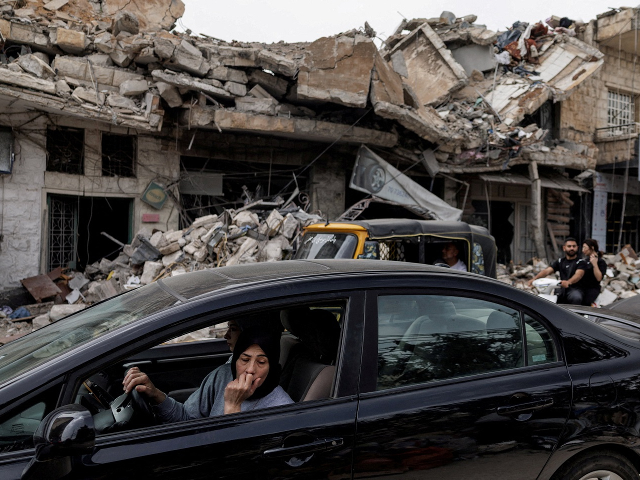A resident of Nabatieh, Lebanon displaced by the fighting between Israel and Hezbollah drives home amid the 10-day ceasefire. Photo: Reuters