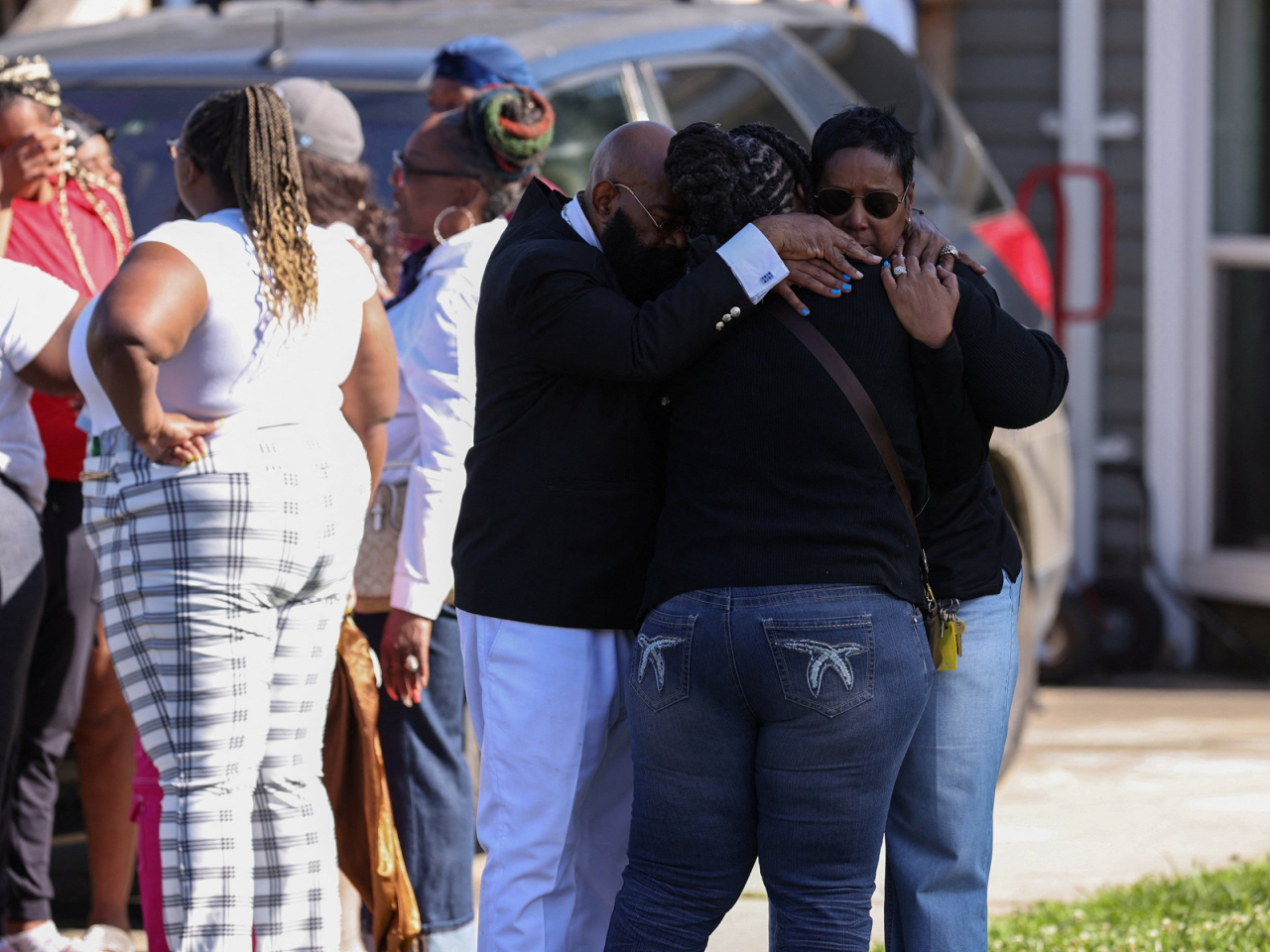 Mourners gather after eight children were killed in a mass shooting incident described as domestic violence in Shreveport, Louisiana. Photo: Reuters