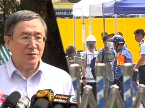 卓永興與官員視察宏福苑居民上樓安排