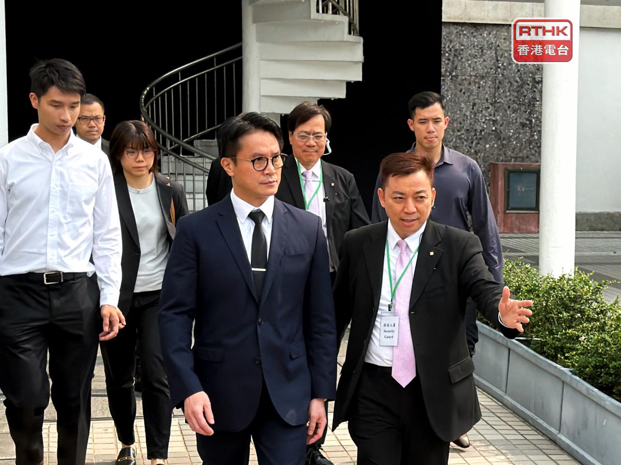 Deputy chief fire officer Fok Chun-ming (in blue) says the fire department will only deal with cases within its remit. Photo: RTHK