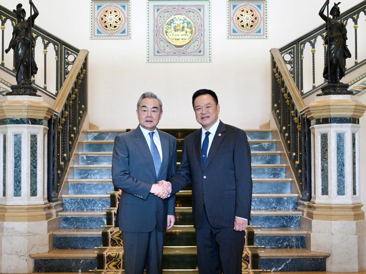 Foreign Minister Wang Yi, left, meets the Thai premier Anutin Charnvirakul in Bangkok. Photo: Royal Thai Government via Reuters