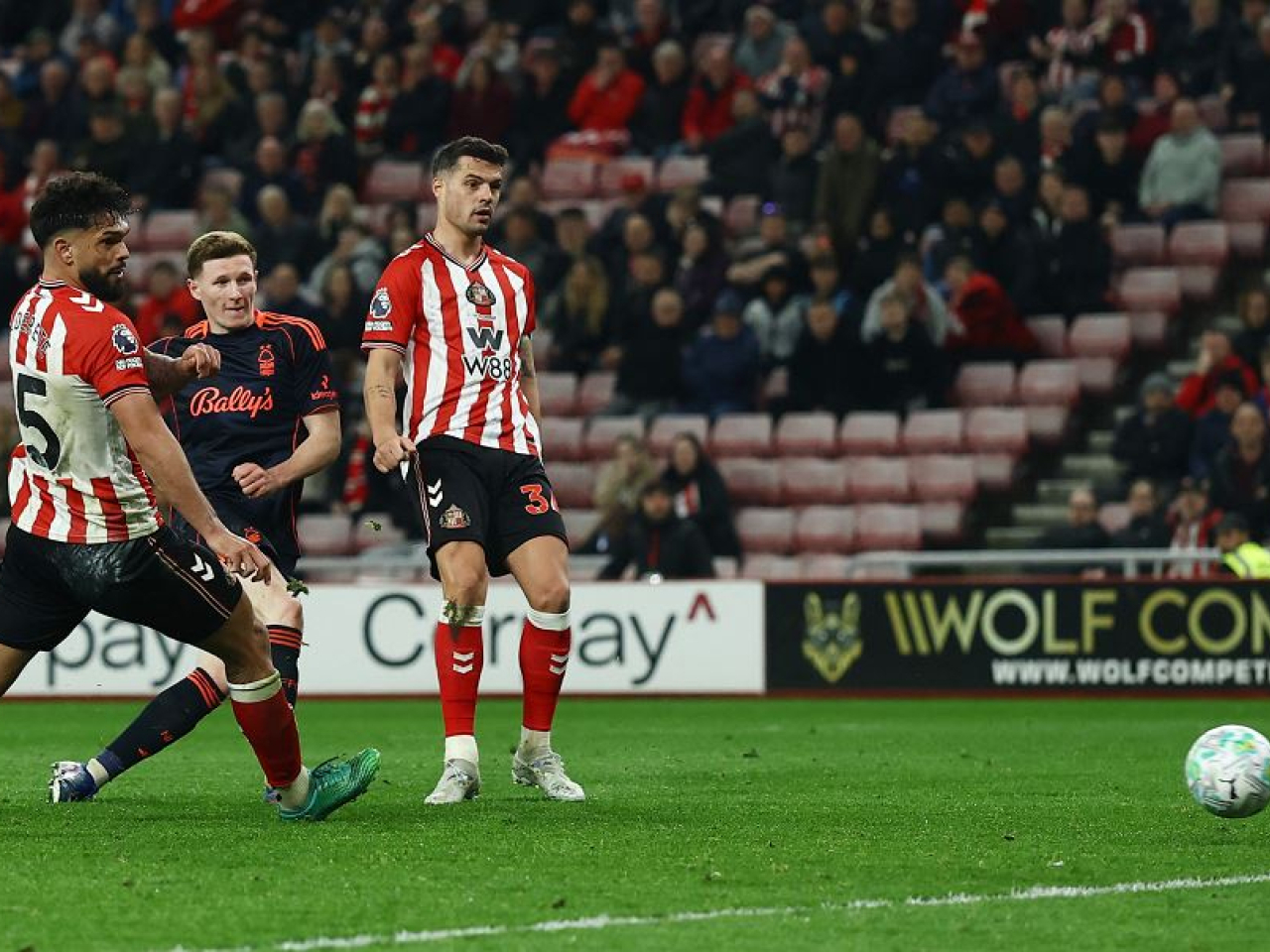 Eliot Anderson strokes the ball home to finish Sunderland off. Photo: Reuters