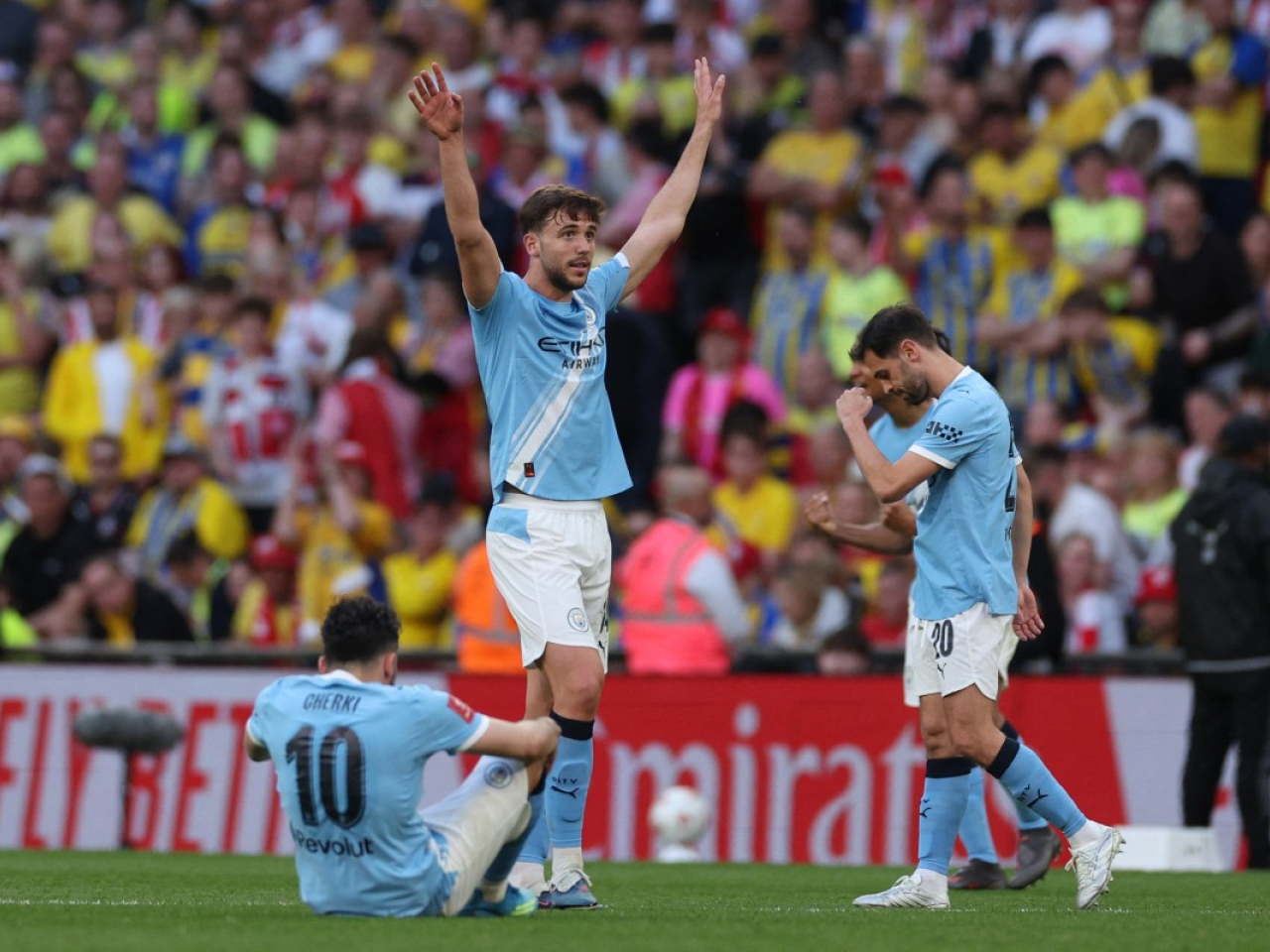 歷高干沙利斯為曼城攻入奠勝一球。（法新社）